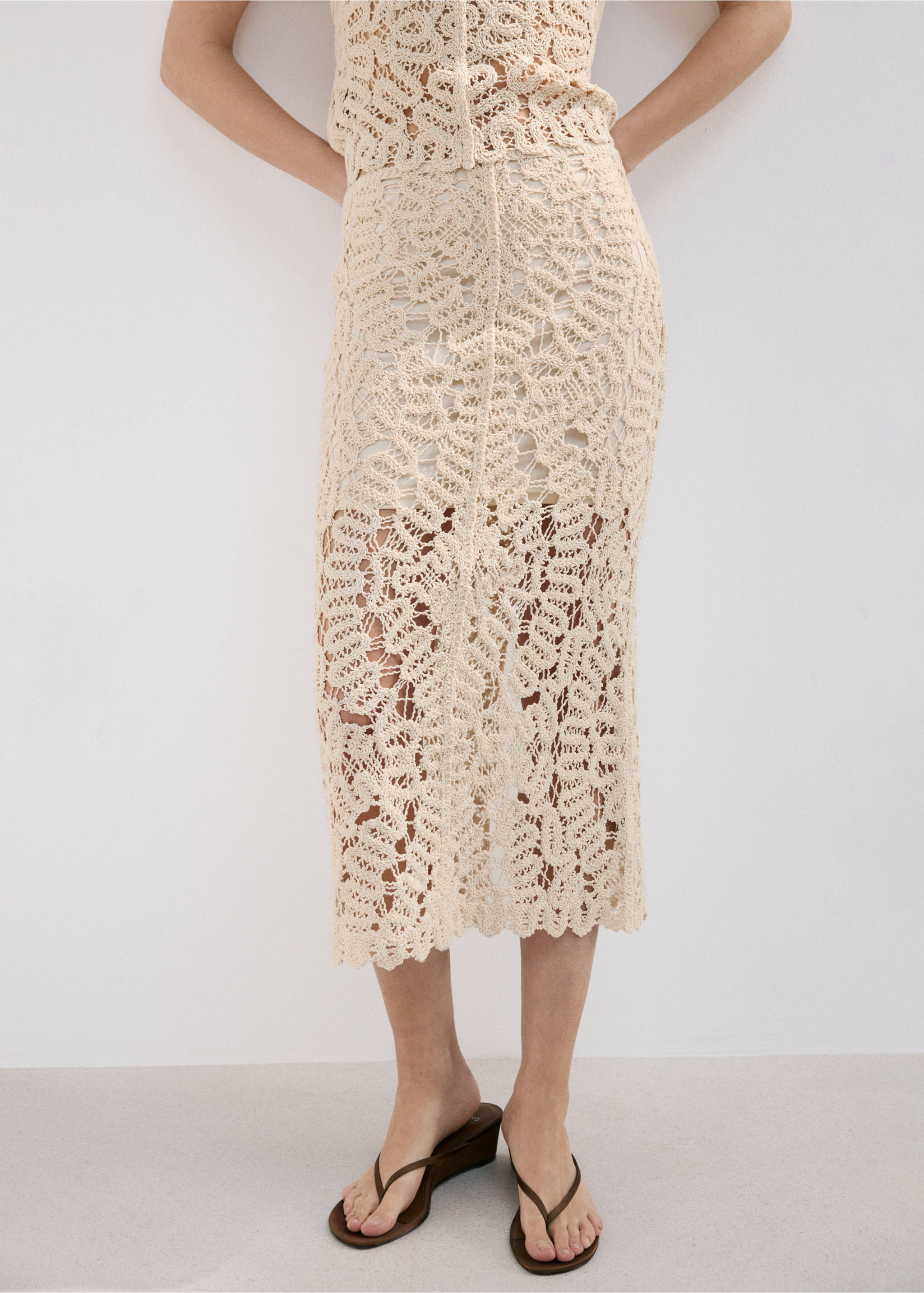 Openwork knitted skirt - Details of the article 6, Sand. Ref: 27067144-00.