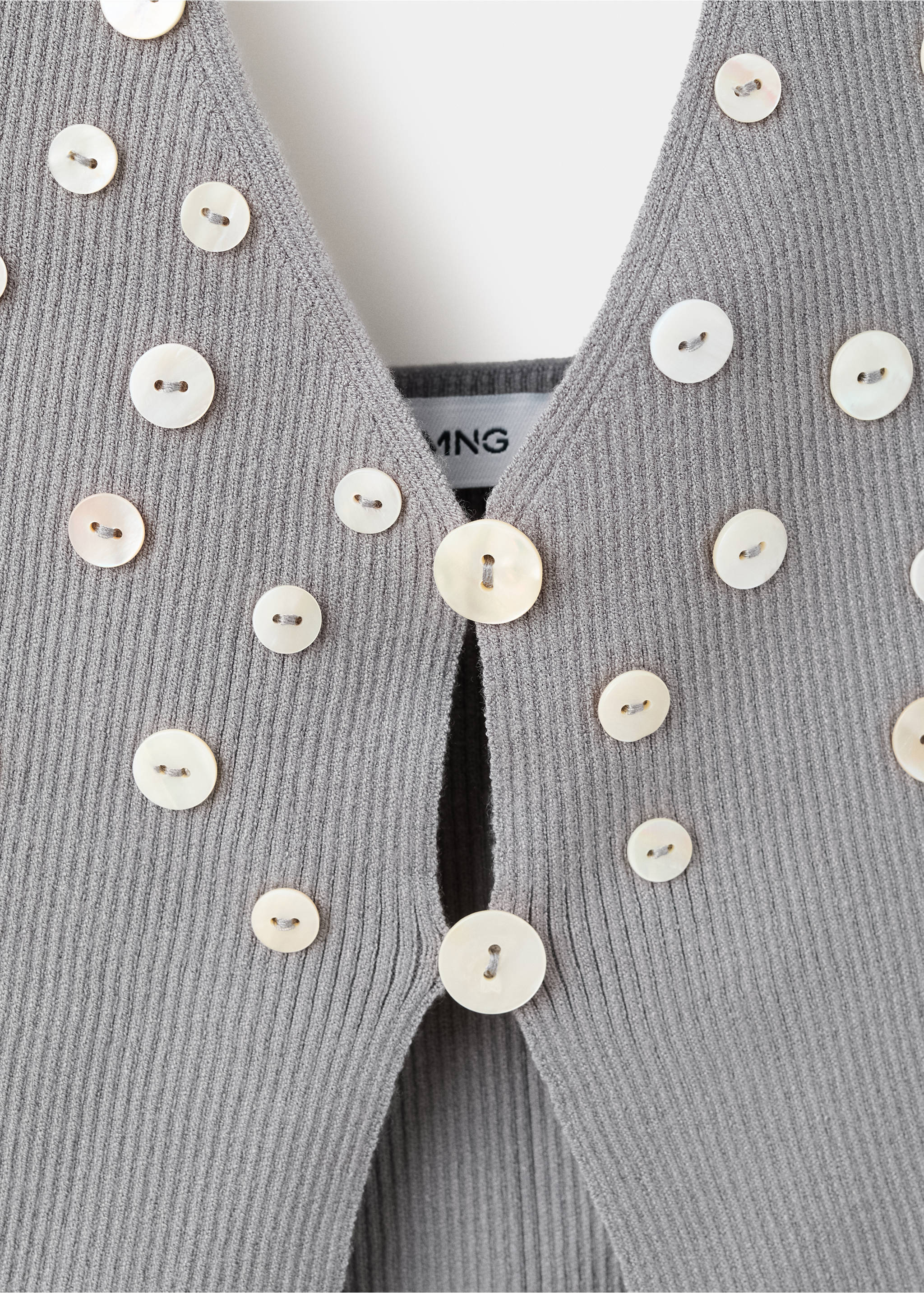 Fitted top with decorative buttons - Details of the article 8, Medium Heather Grey. Ref: 27068657-00.