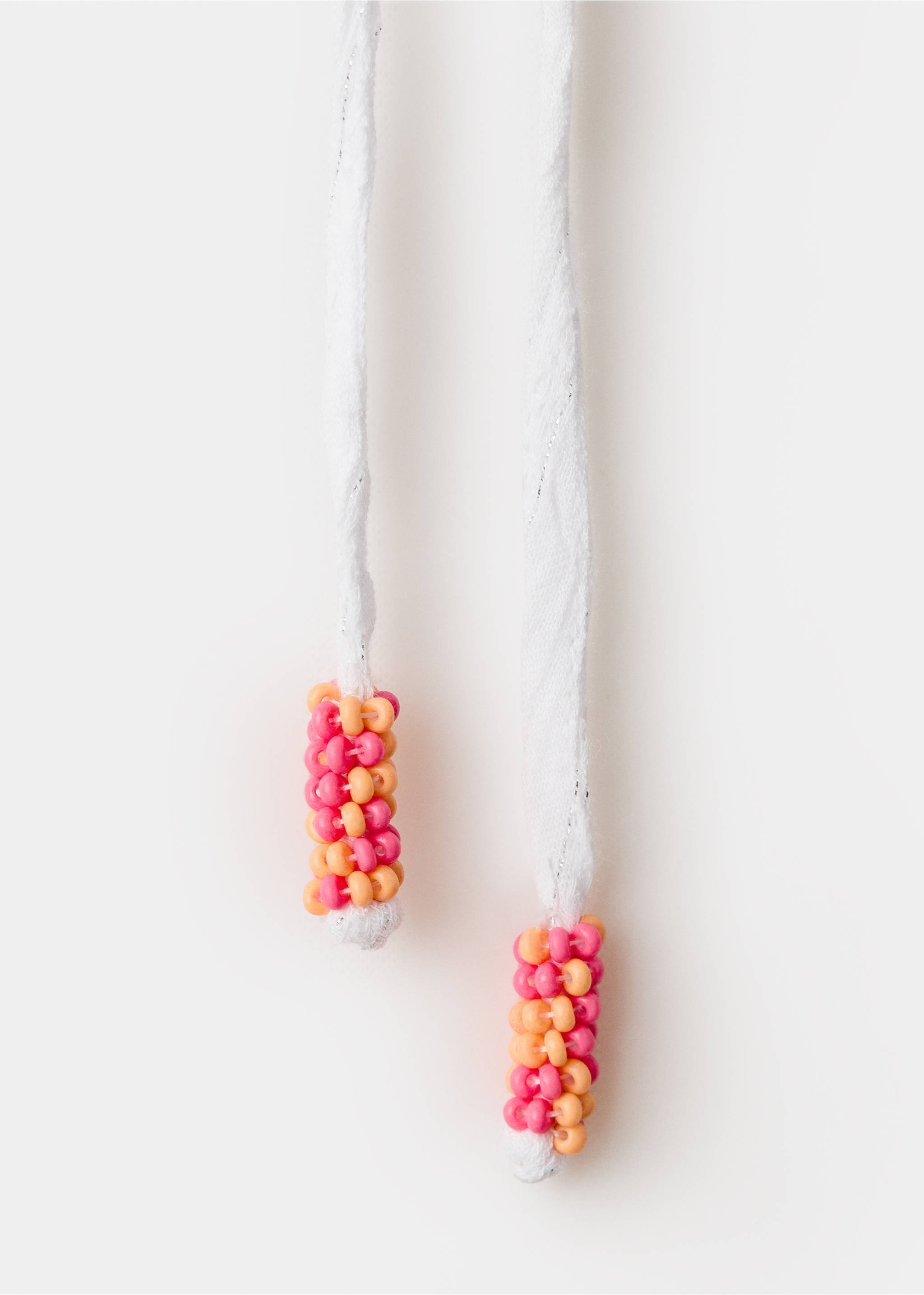 توب كشكشة به ياقة هالتر - تفاصيل المنتج 0, سكري. Ref: 27069212-00.