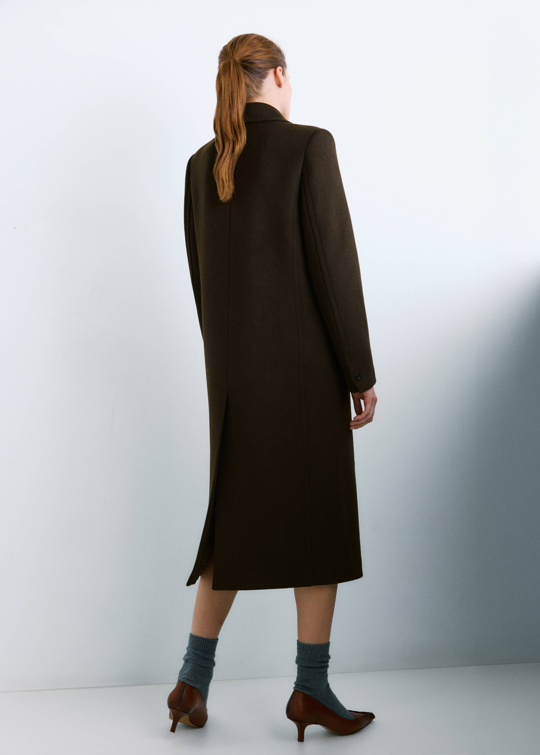 Double-breasted wool coat - Reverse of the article