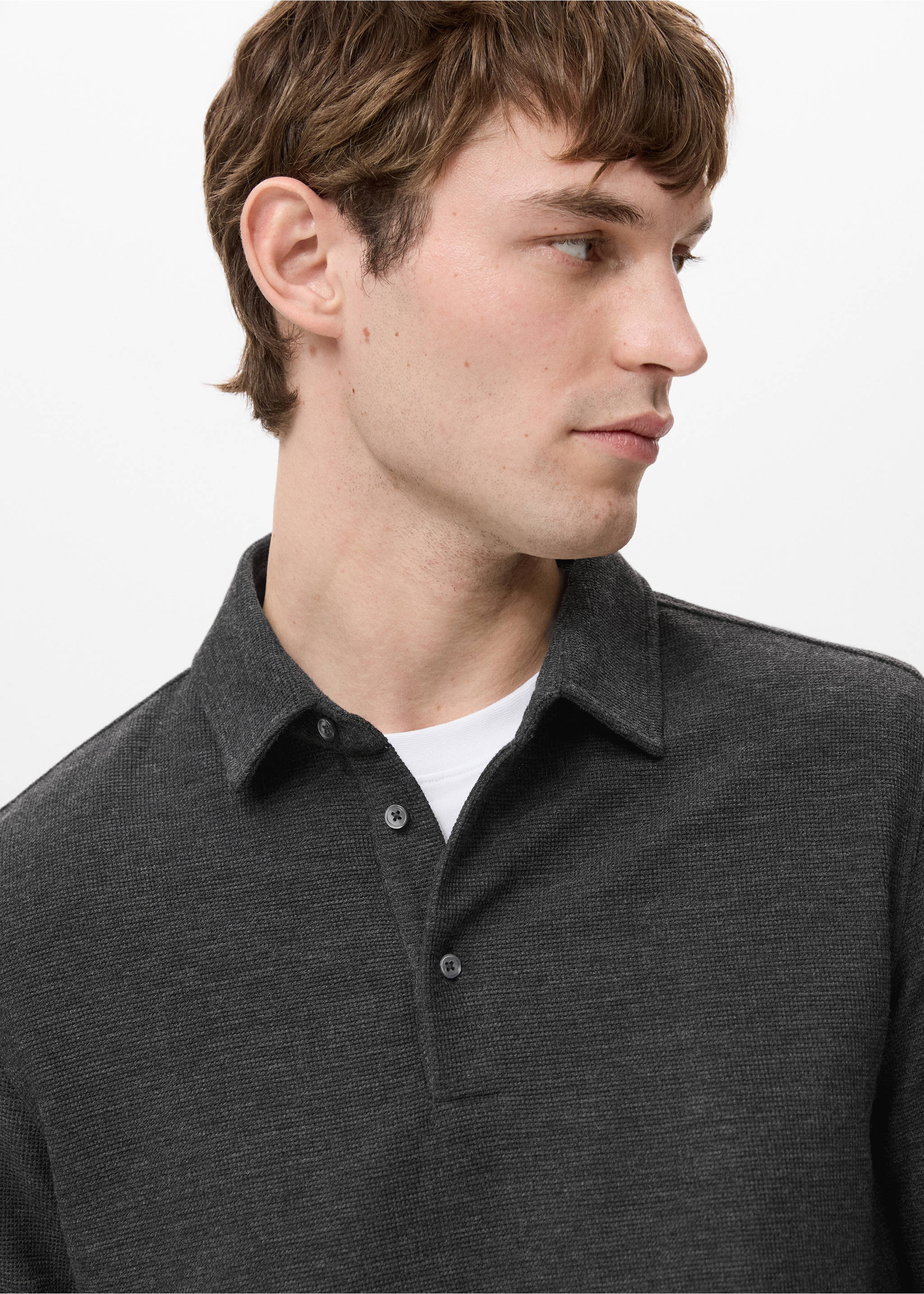 Knitted structured polo sweater - Details of the article 1, Dark Heather Grey. Ref: 27071324-00.