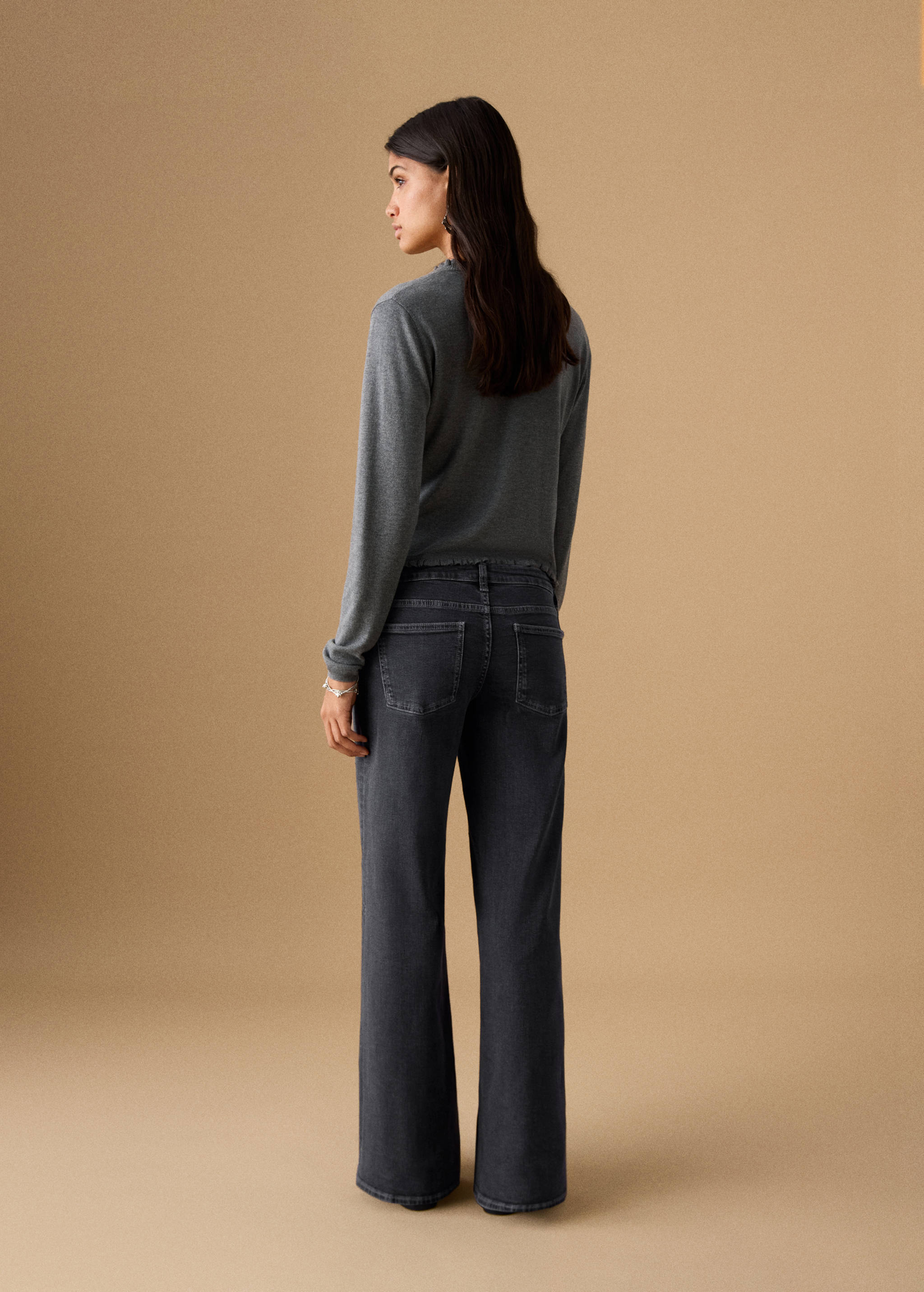 Джинсы с низкой талией и заклепками - Обратная сторона изделия