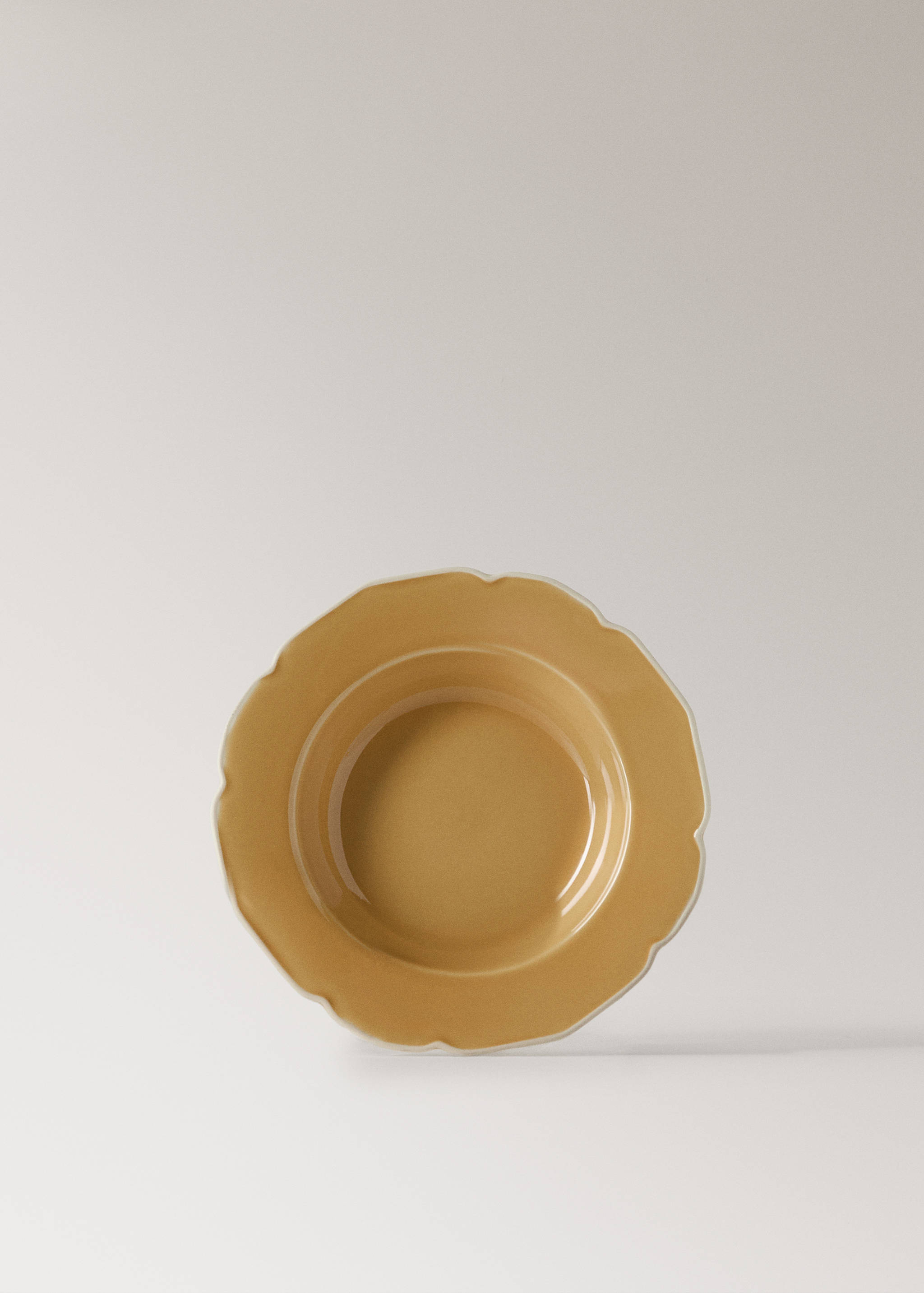 Stoneware deep plate with waves - Article without model