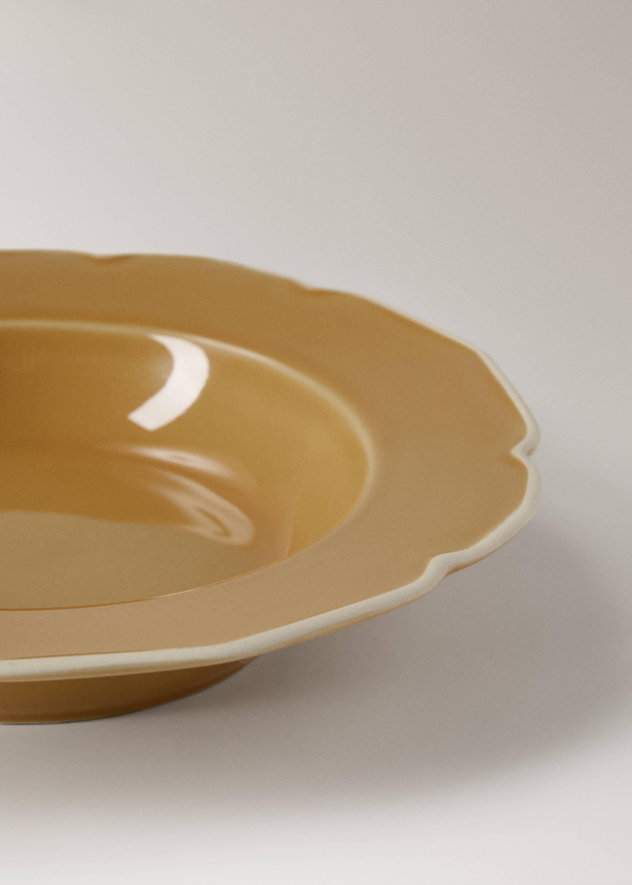 Stoneware deep plate with waves - Details of the article 2