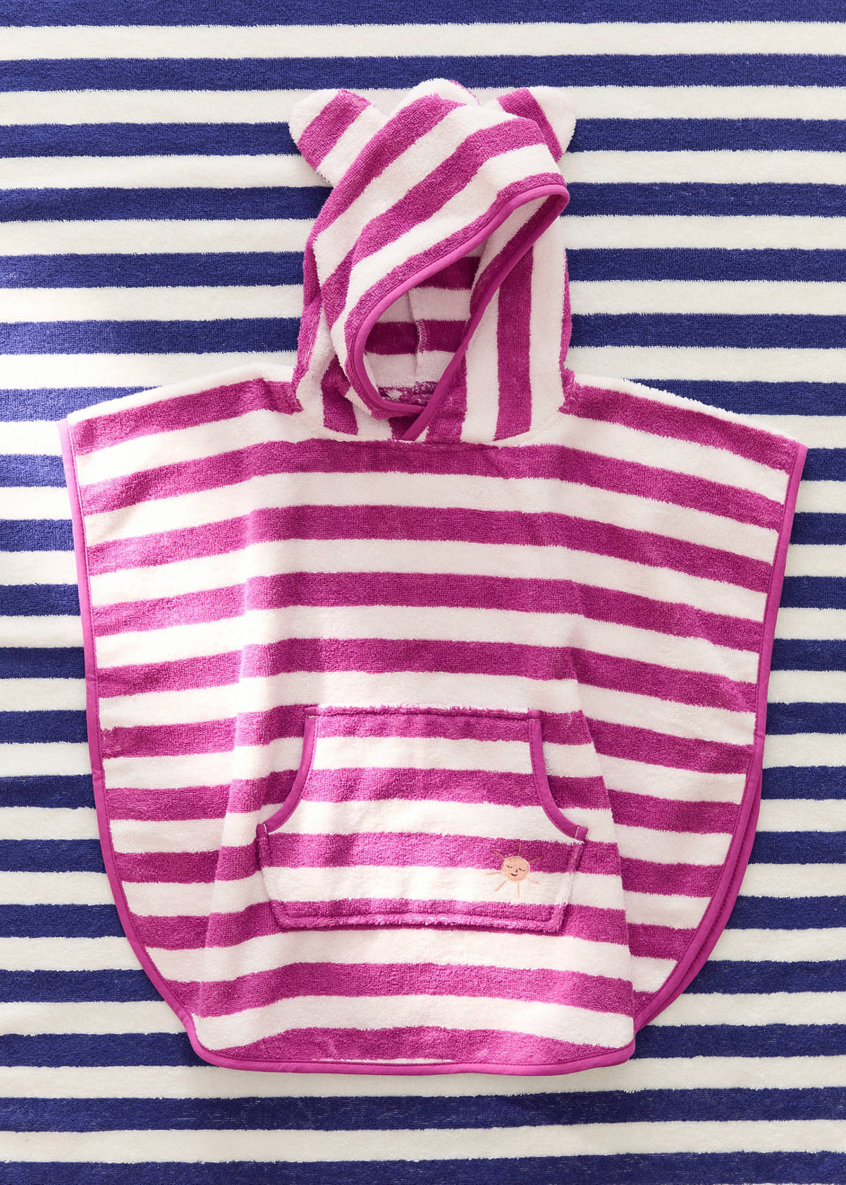 Striped poncho towel — Fuchsia