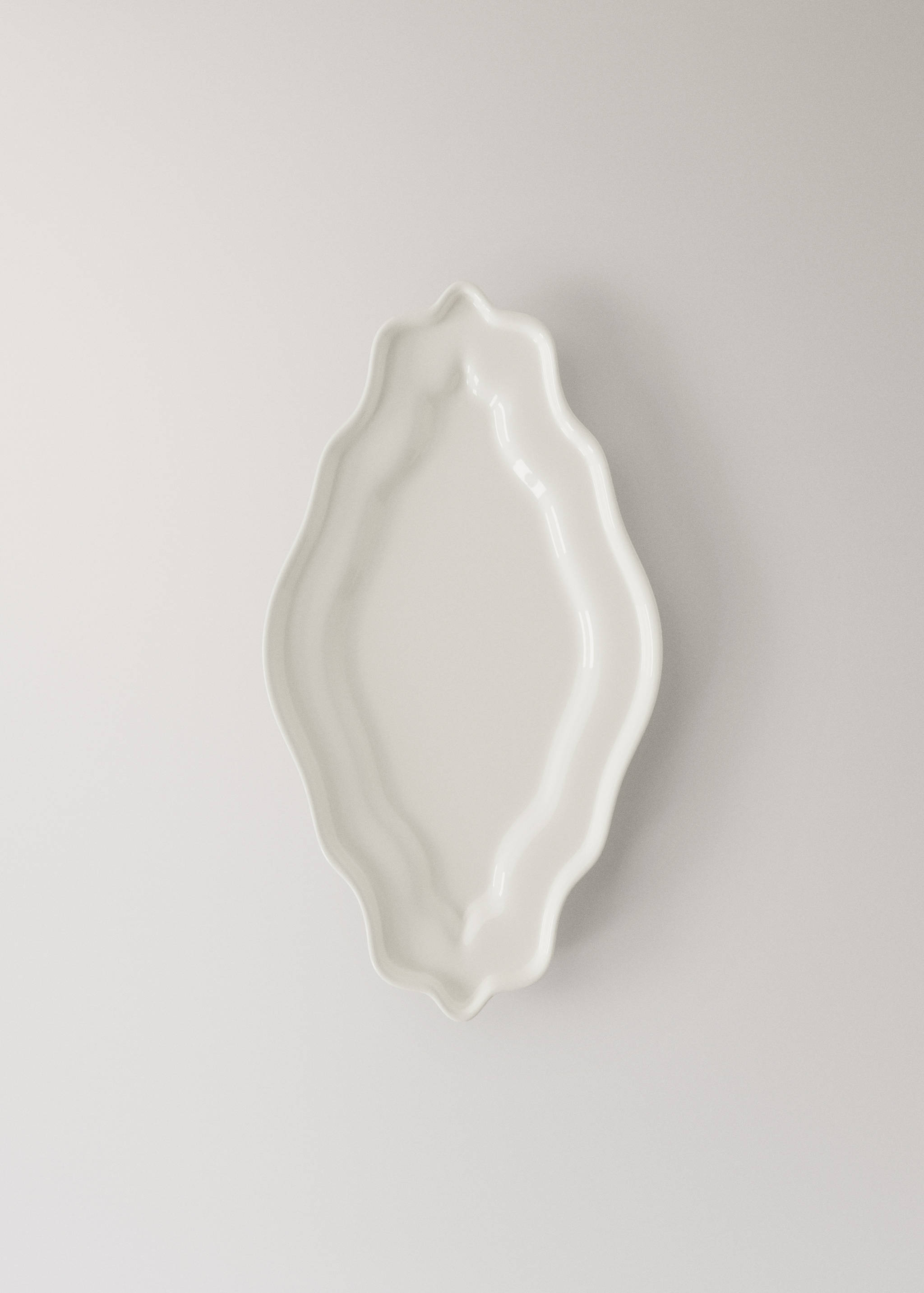 Schale aus Stahl mit reliefartigen Rändern - Artikel ohne Model