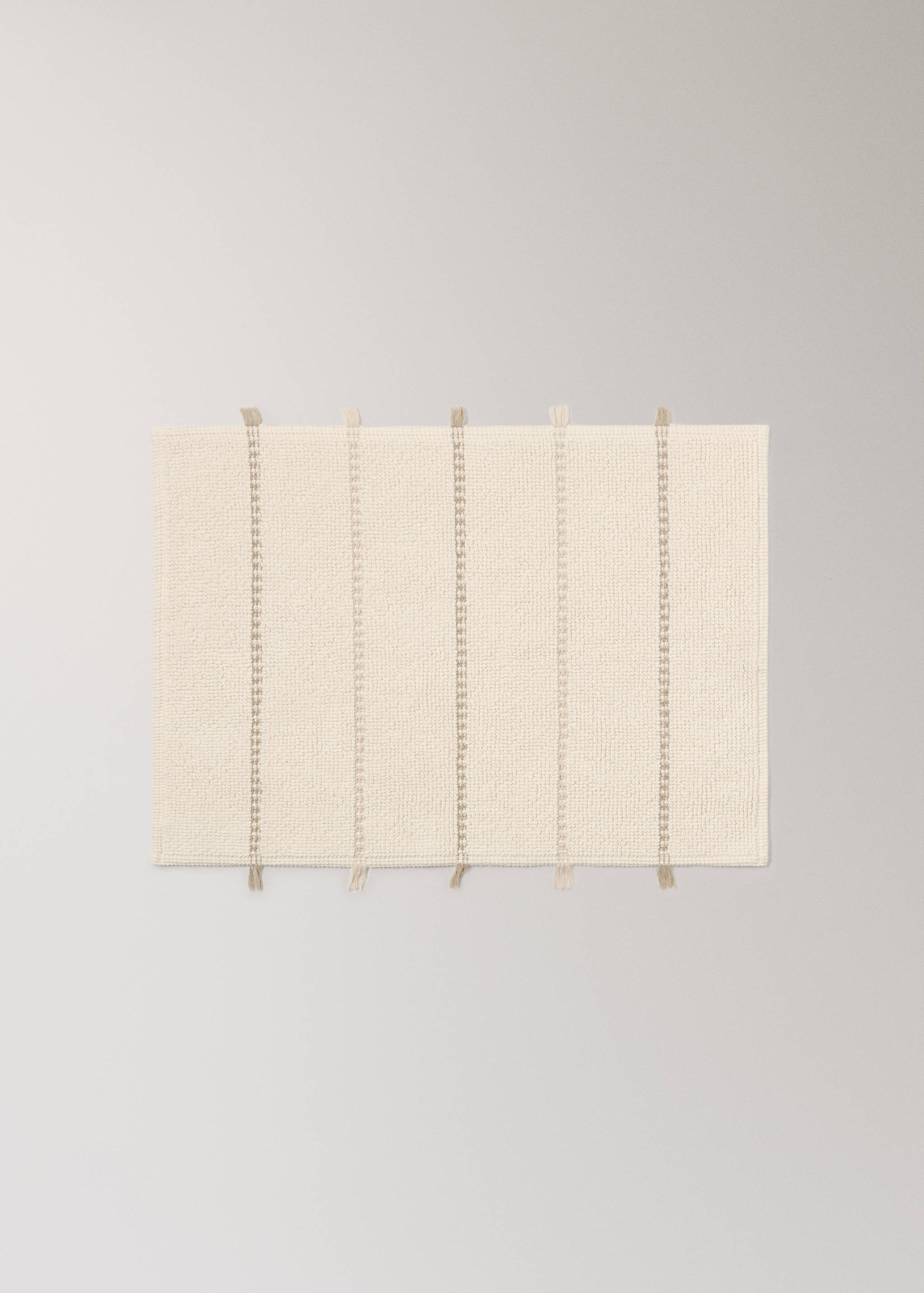 Striped bath mat with fringe detail - Article without model