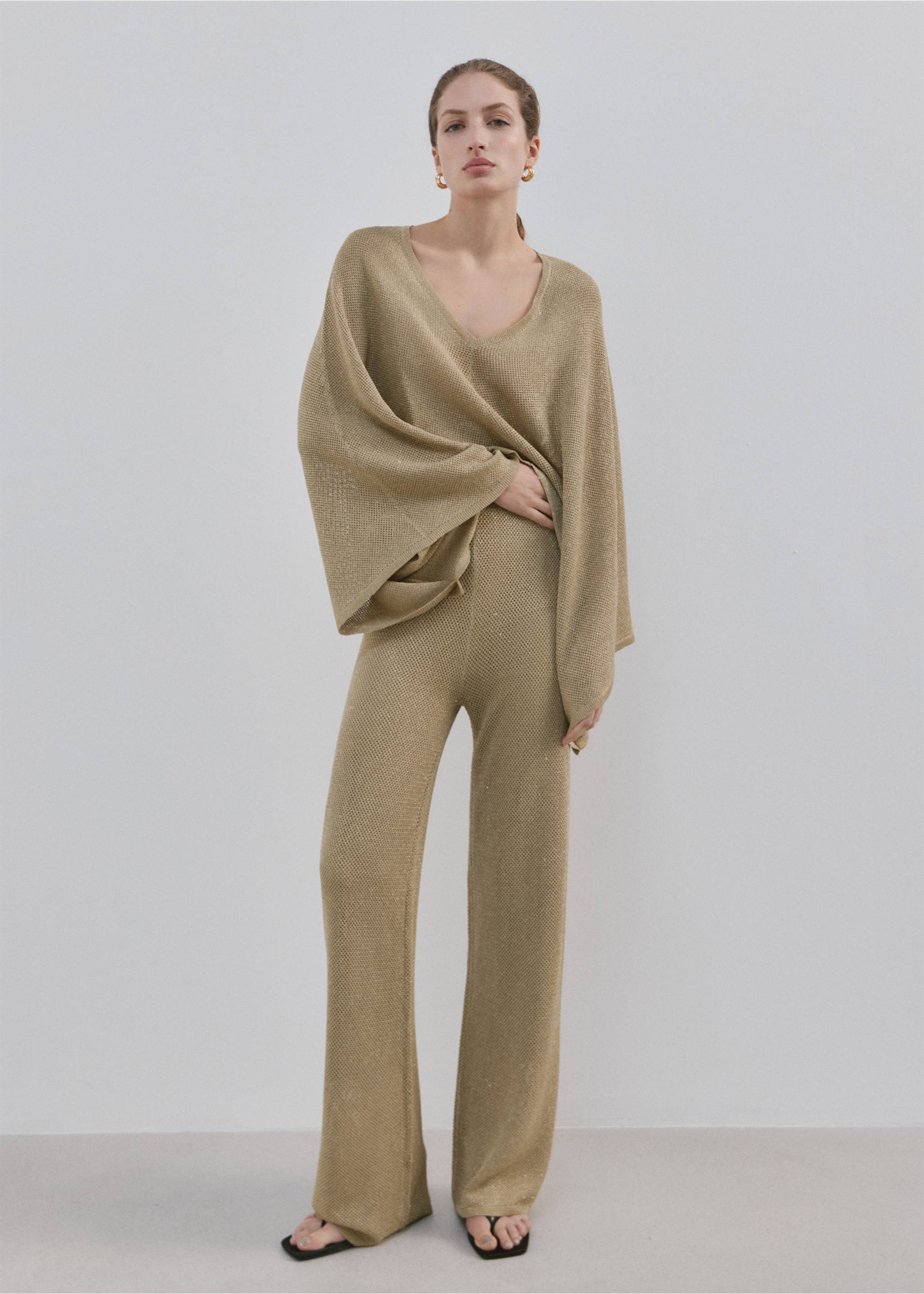 Knit trousers with mid-rise - General plane, Gold. Ref: 27074074-00.