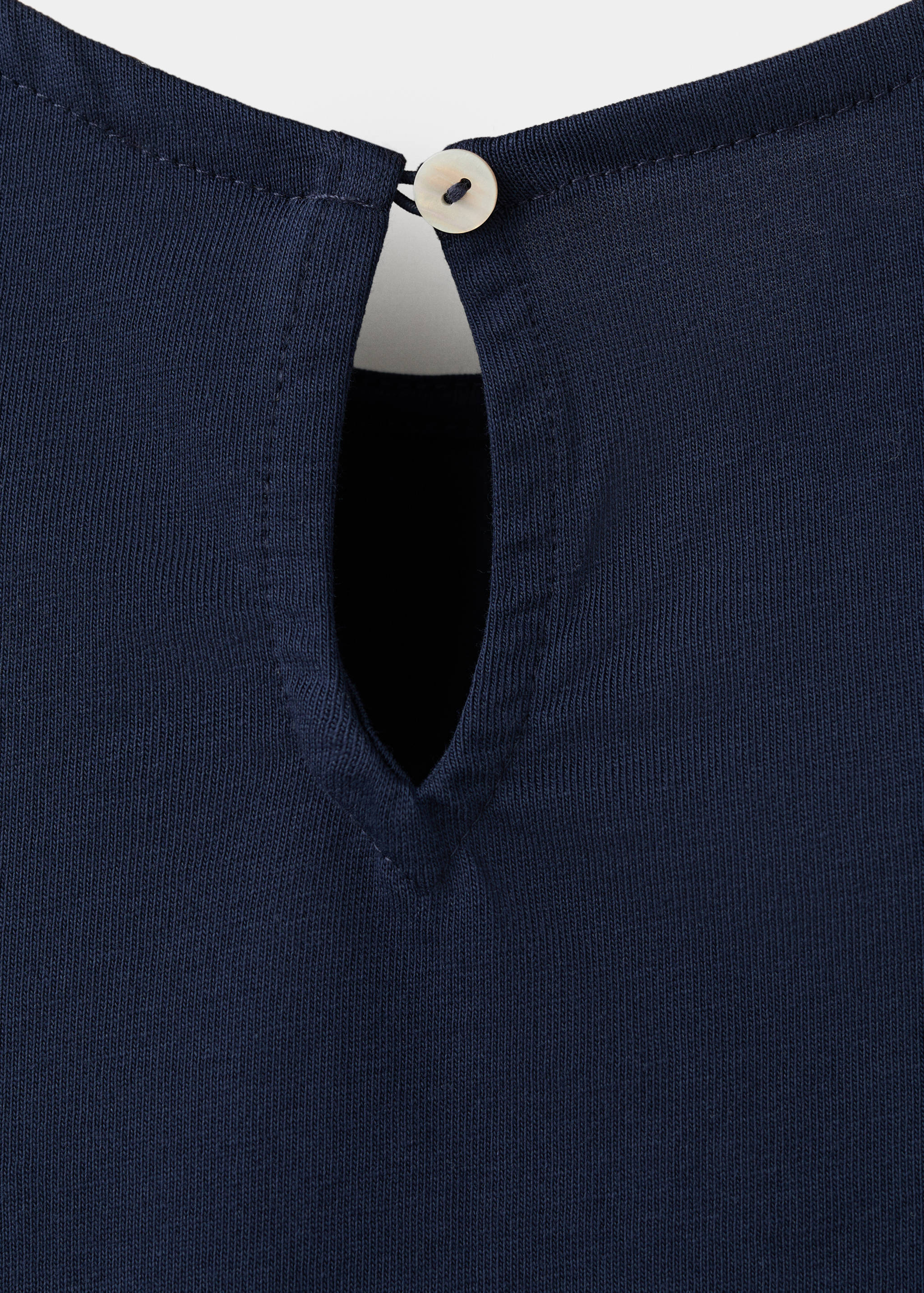 Top à fleurs en relief - Détail de l'article 0