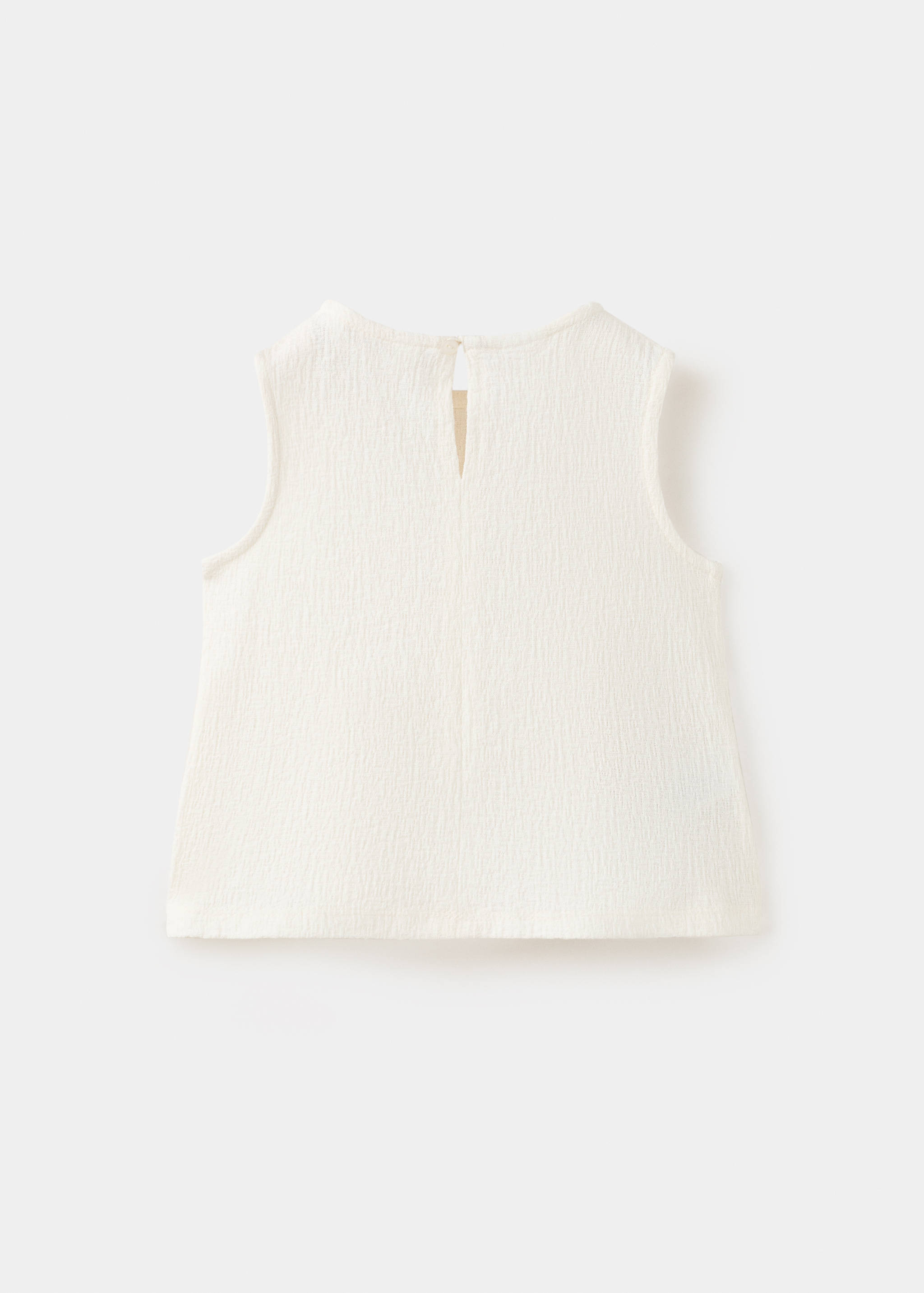 Blusa fluida textura - Reverso del artículo