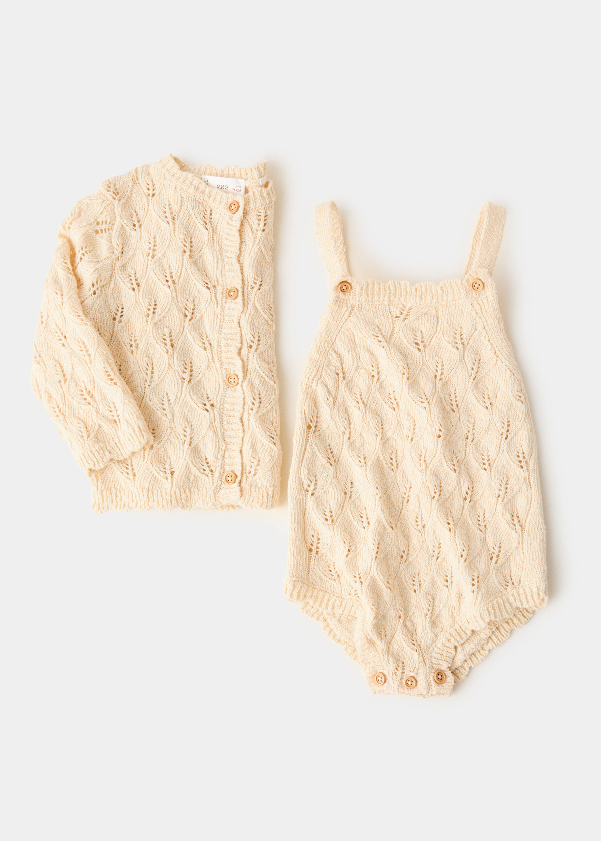 Cotton openwork knitted romper - Details of the article 8
