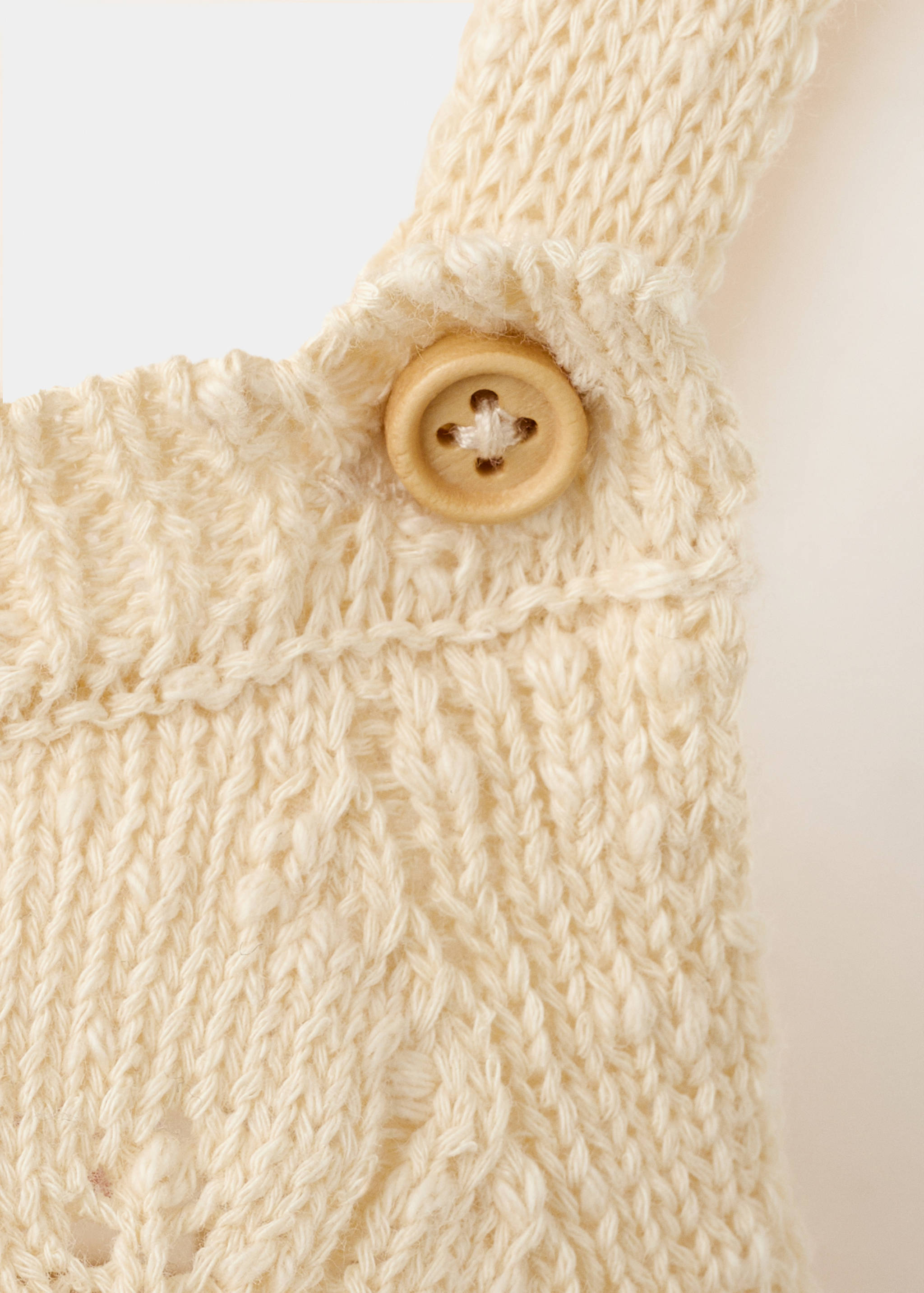 Cotton openwork knitted romper - Details of the article 0