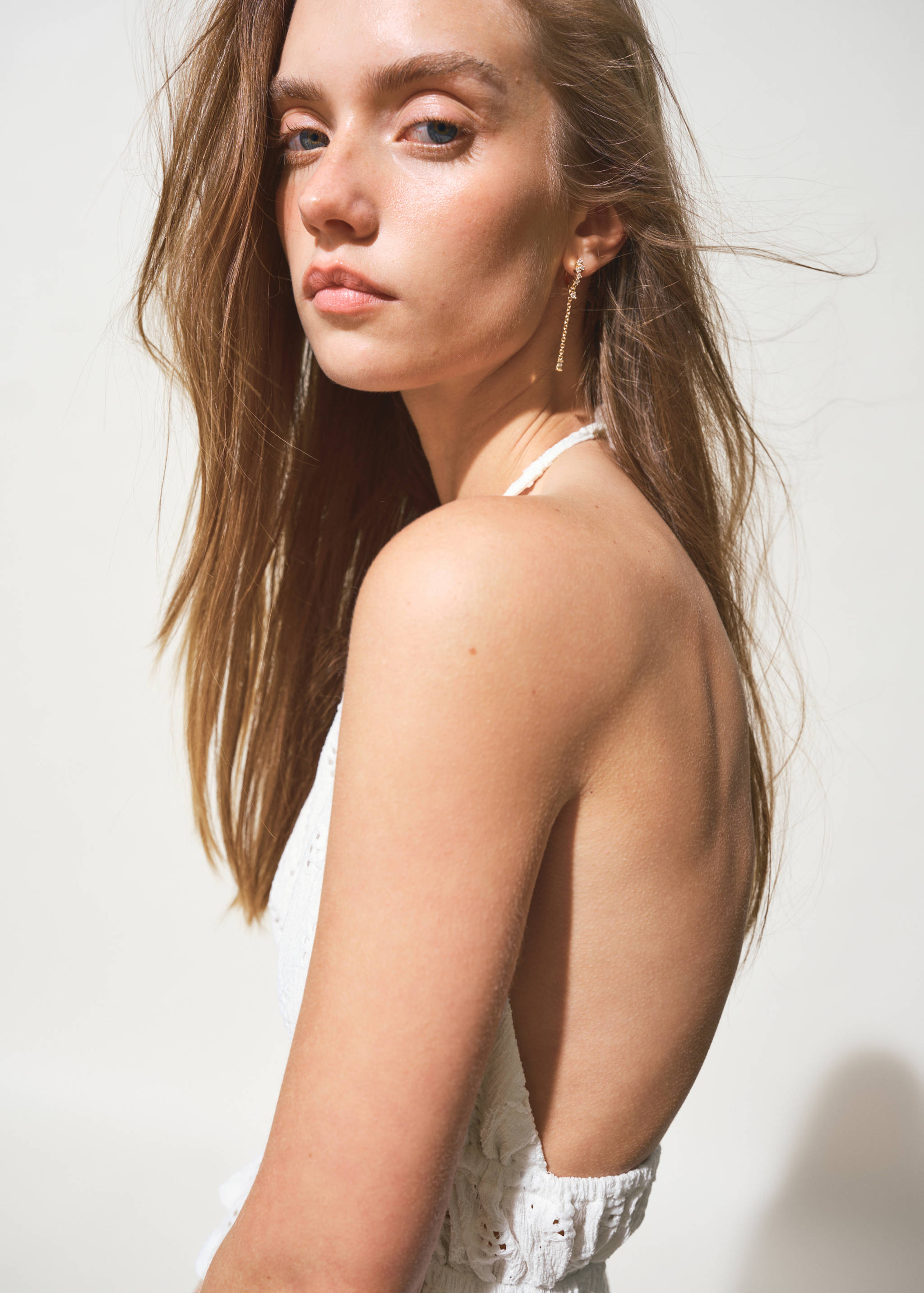 Halter top with embroidered details - Details of the article 1