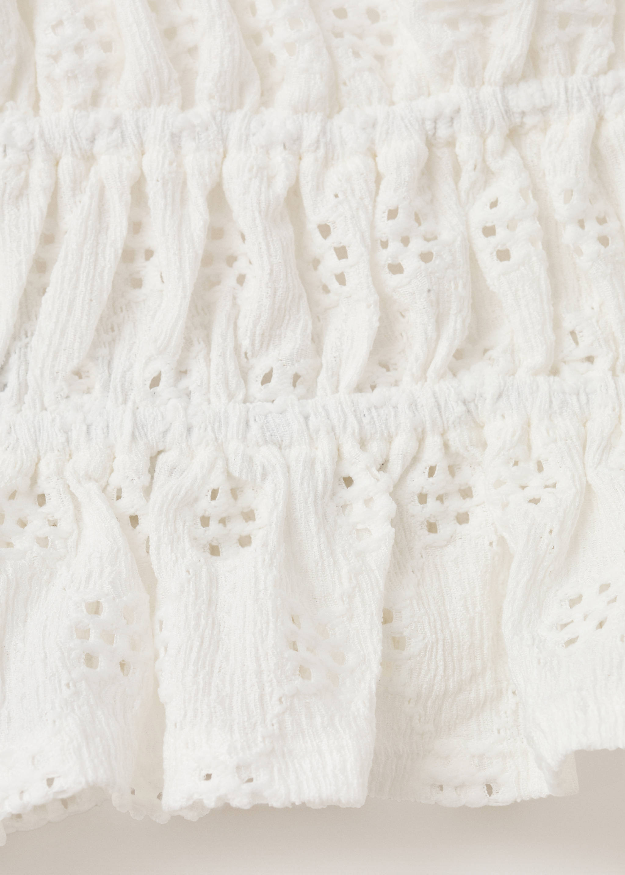 Halter top with embroidered details - Details of the article 0