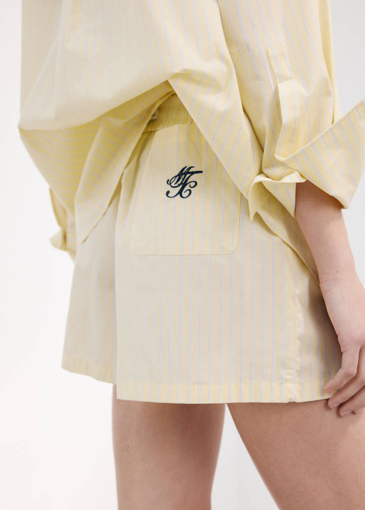 Striped poplin shorts with embroidered message — Yellow