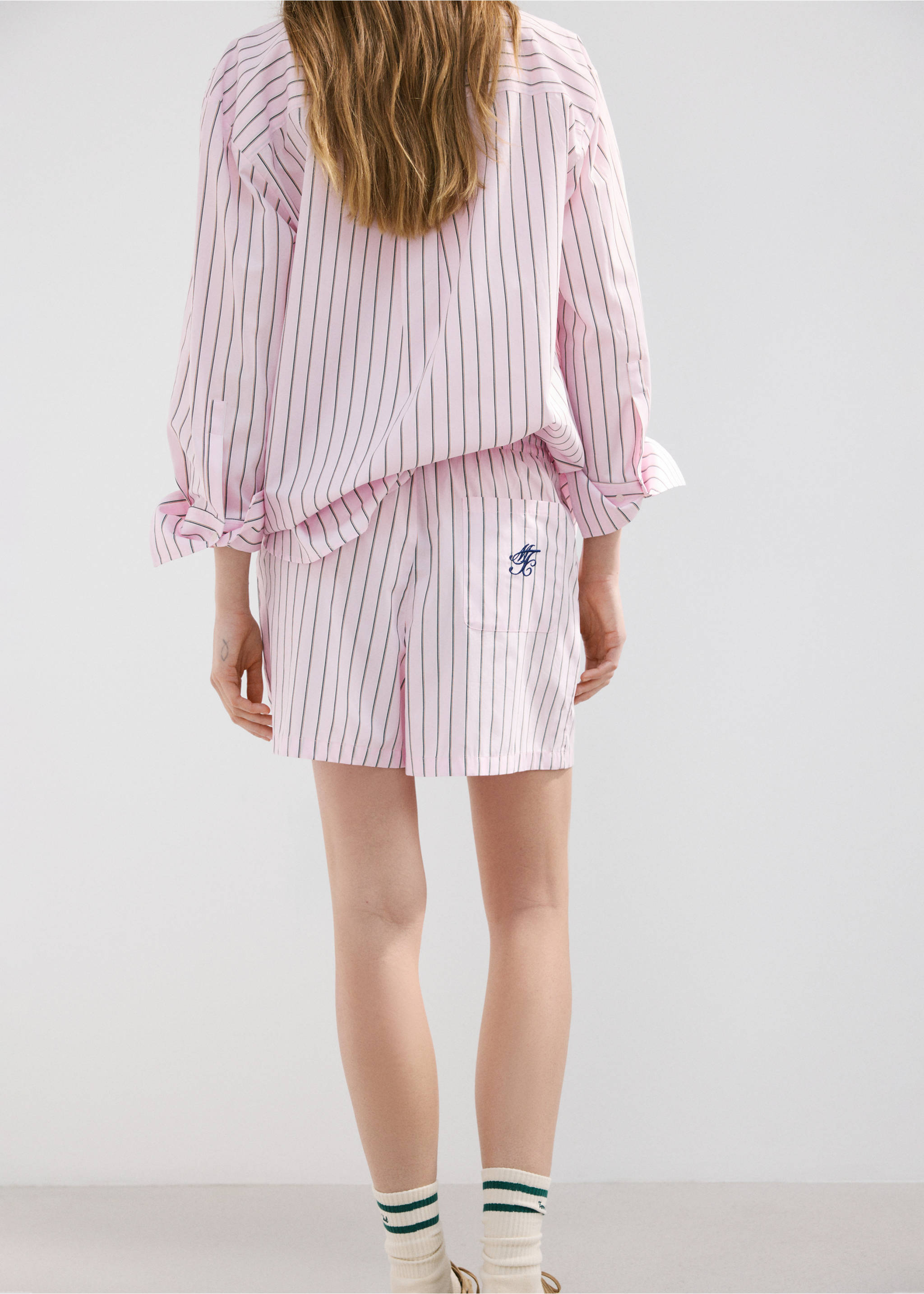 Striped poplin shorts with embroidered message - Reverse of the article, Pastel Pink. Ref: 27077167-00.