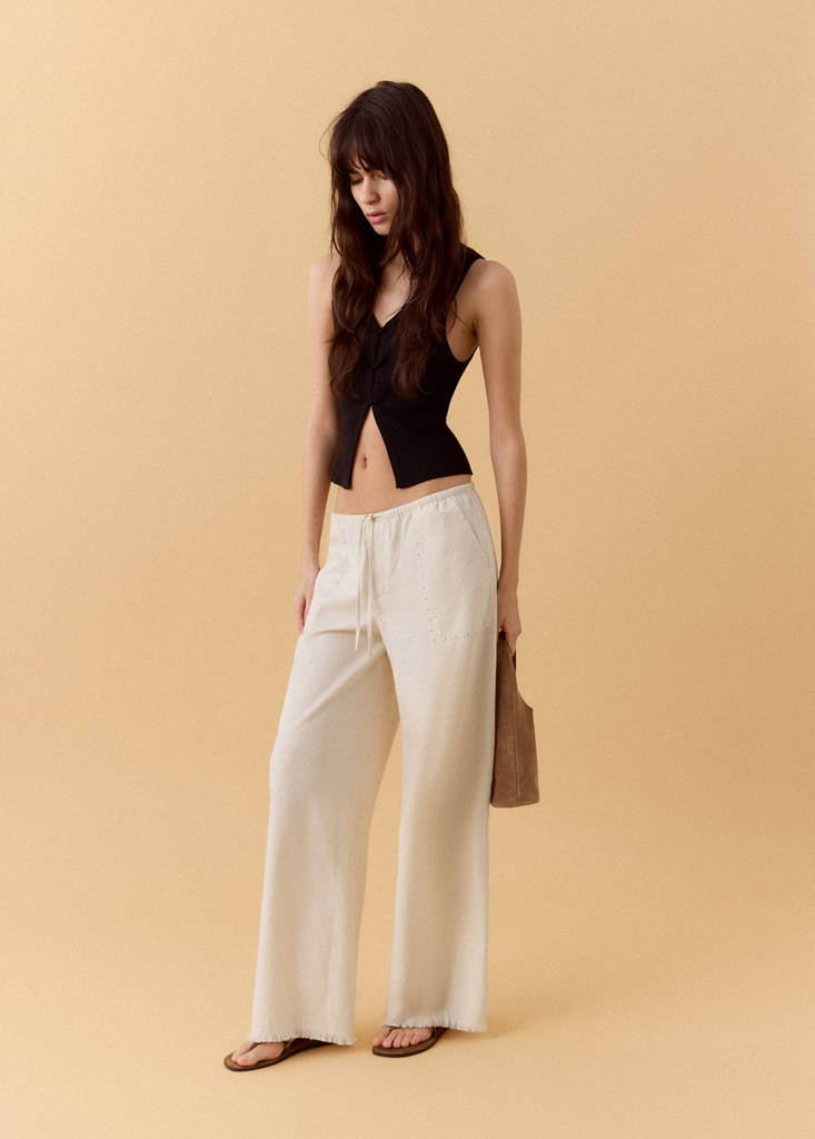 Fluid trousers with studs — Sand