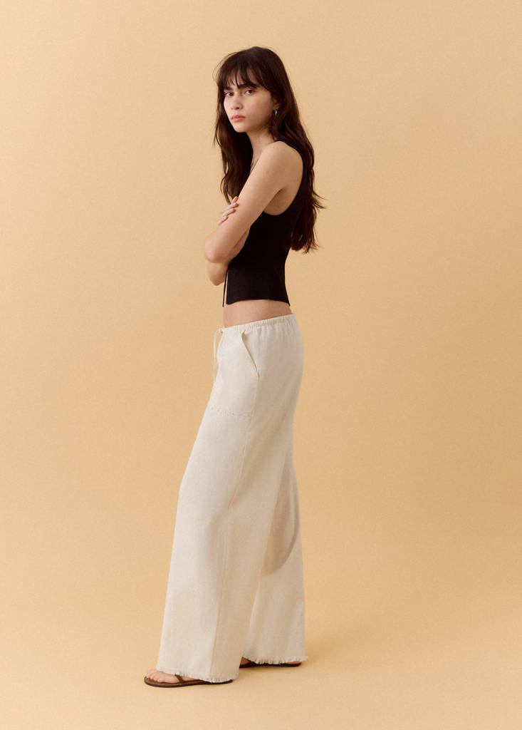 Fluid trousers with studs — Sand