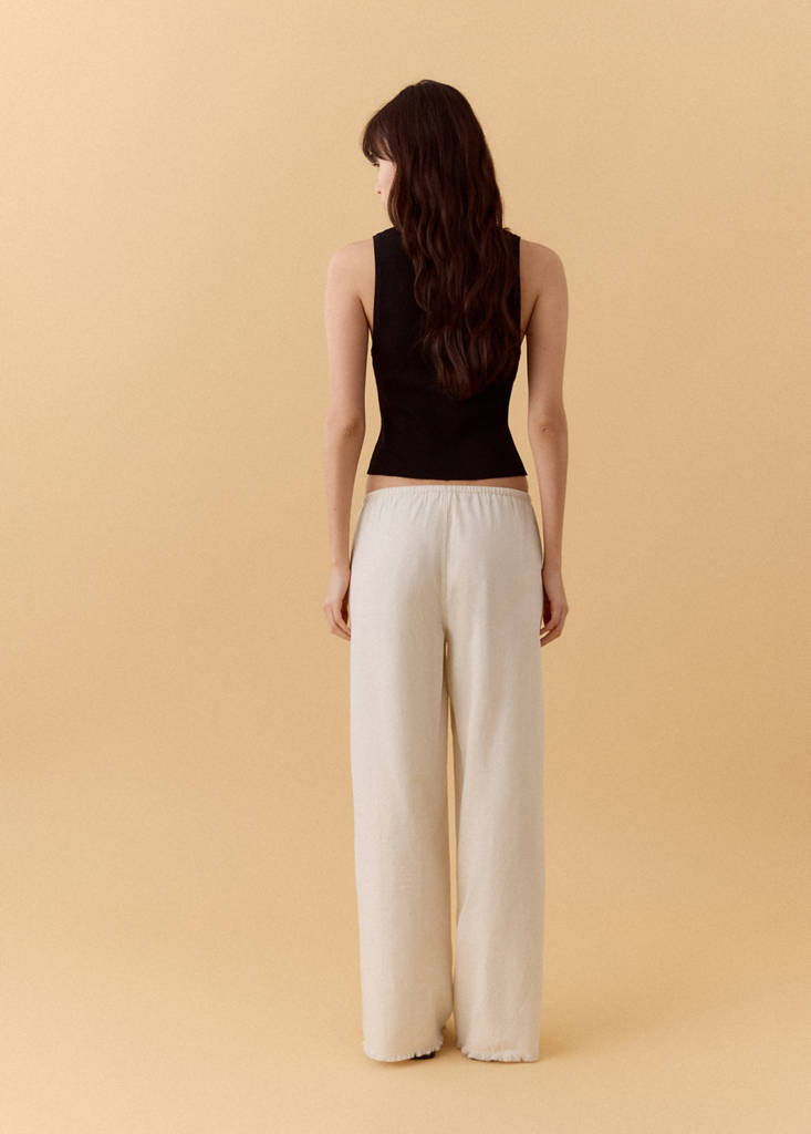 Fluid trousers with studs — Sand