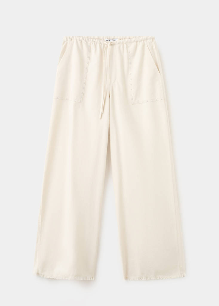 Fluid trousers with studs — Sand