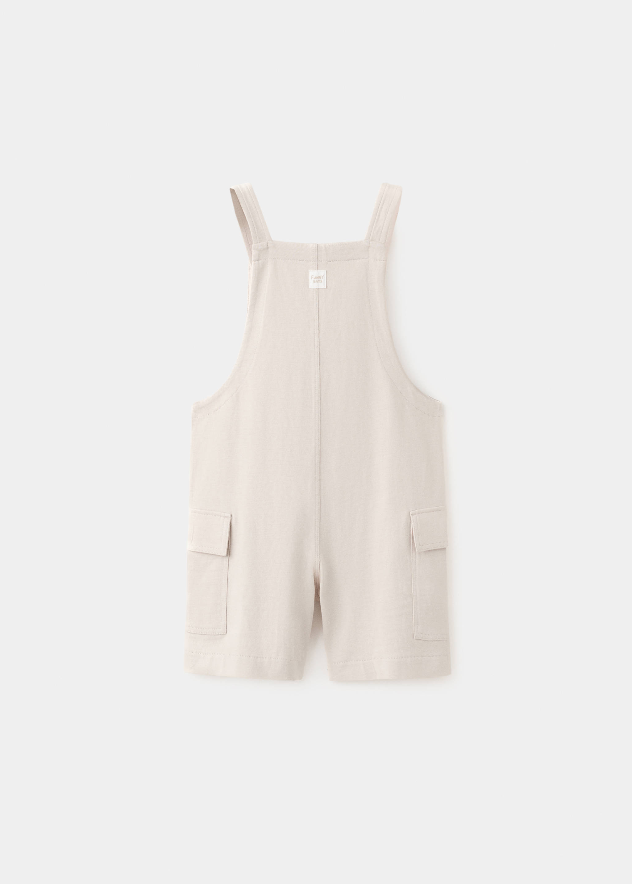 Cotton dungarees with cargo pockets - Reverse of the article