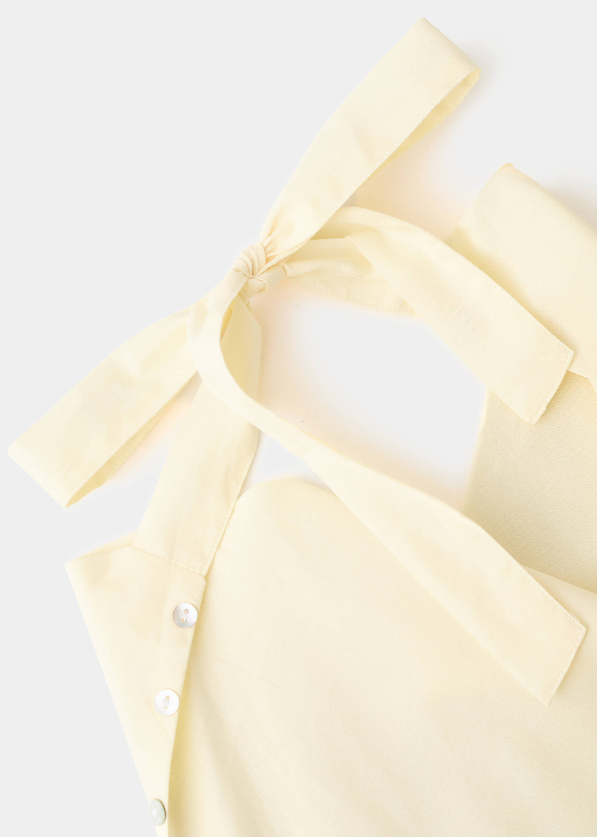 Halter neck button top - Details of the article 8, Pastel Yellow. Ref: 27078656-00.