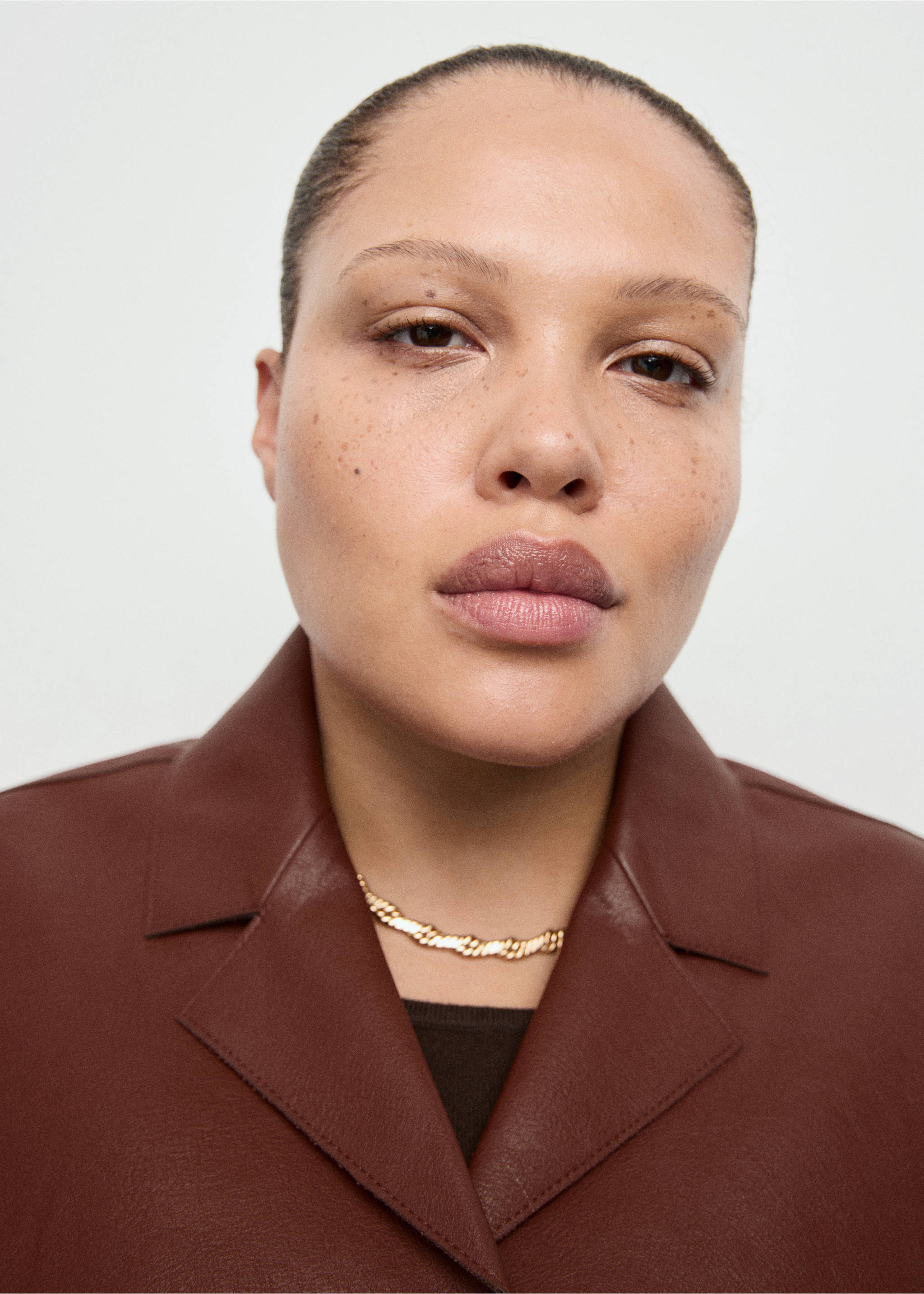 Faux-leather jacket with pockets - Details of the article 4, Burnt Orange. Ref: 27081190-00.