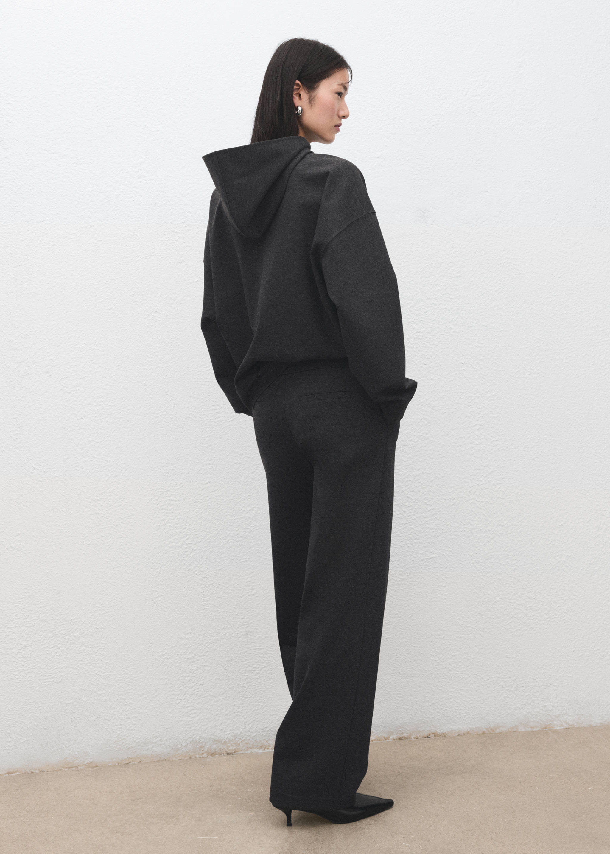 Speckled knitted sweatshirt with hood - Reverse of the article