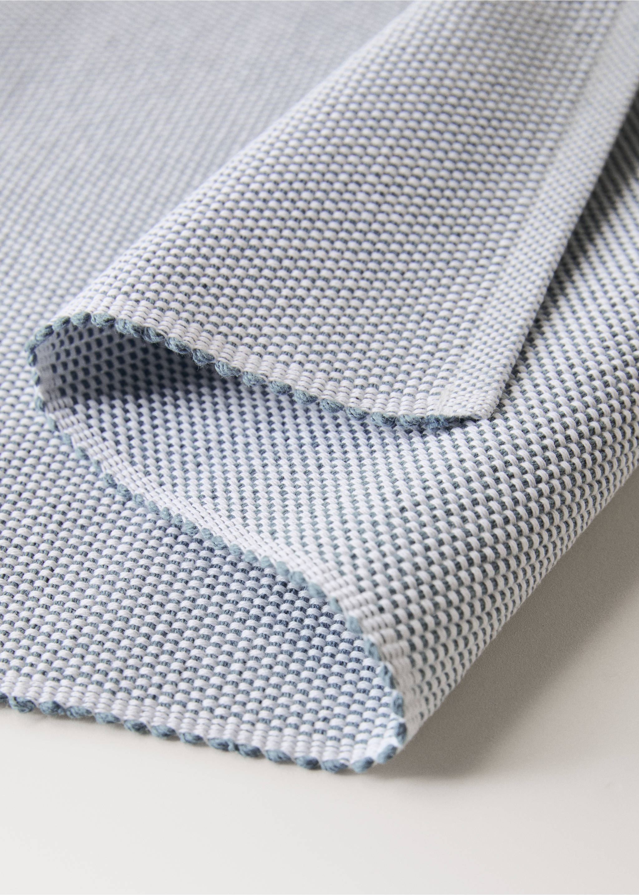Bordbrikke i bomull med spettet effekt - Artikkeldetalj 1, Blå. Ref: 27081309-00.