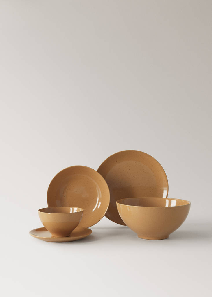 Stoneware serving dish with spots — Leather