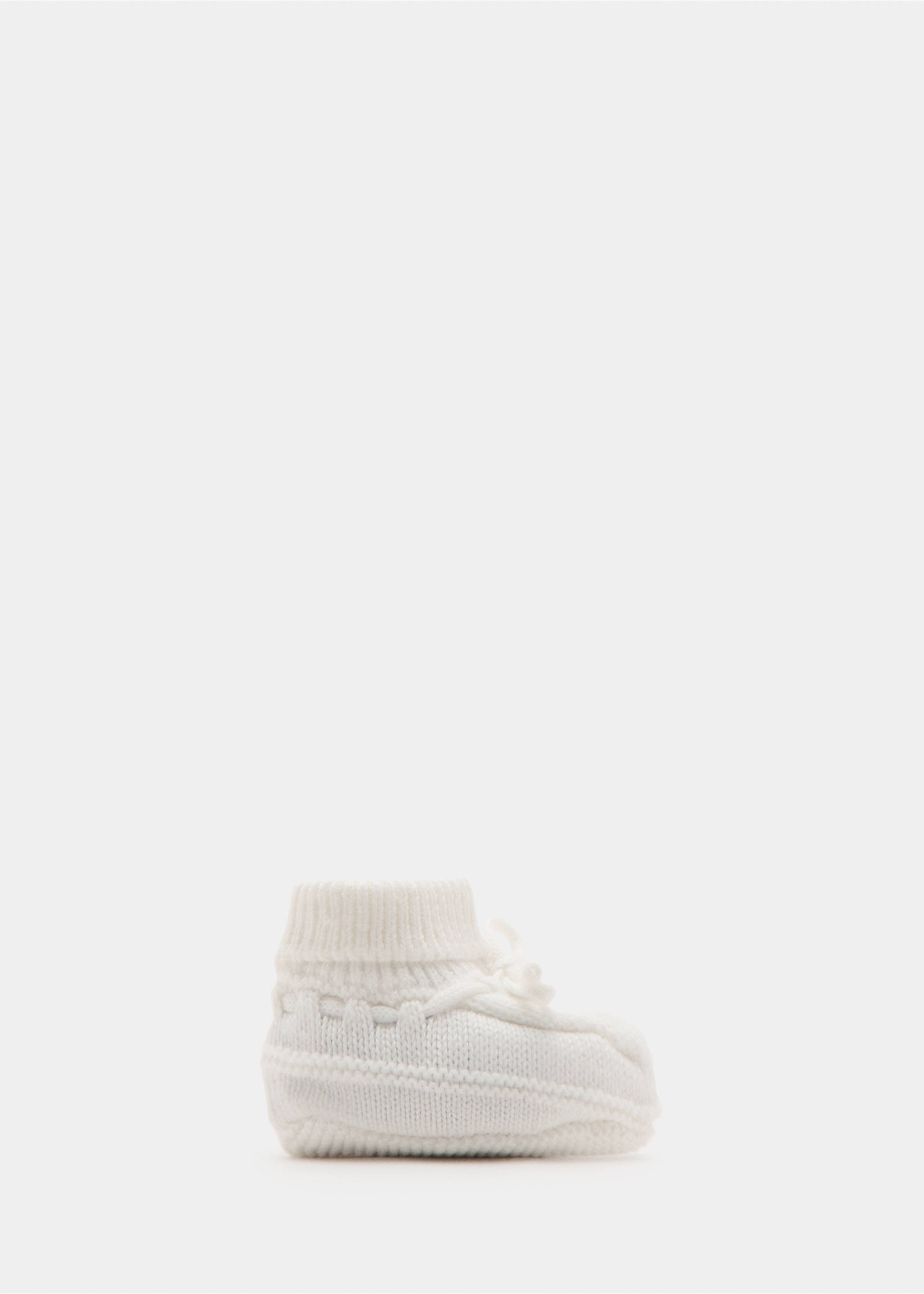Knitted booties with bow - Article without model, Off White. Ref: 27082003-00.