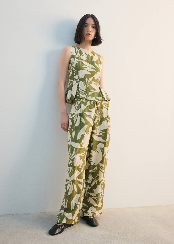 Peplum top with pleated panels — Green