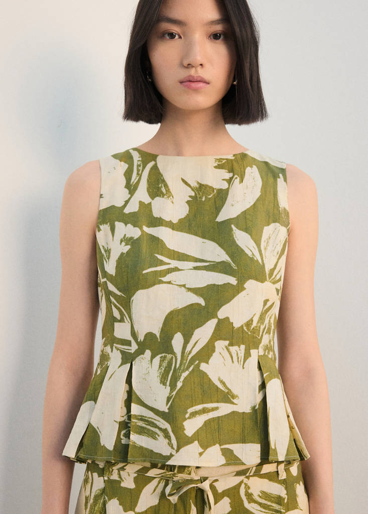 Peplum top with pleated panels — Green