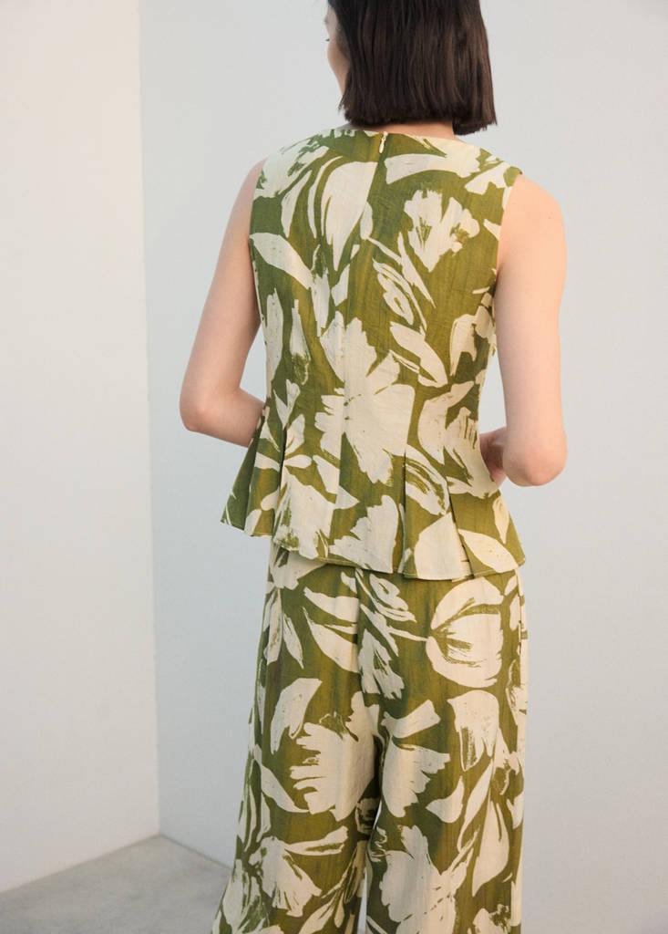 Peplum top with pleated panels — Green