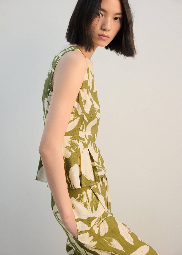 Peplum top with pleated panels — Green