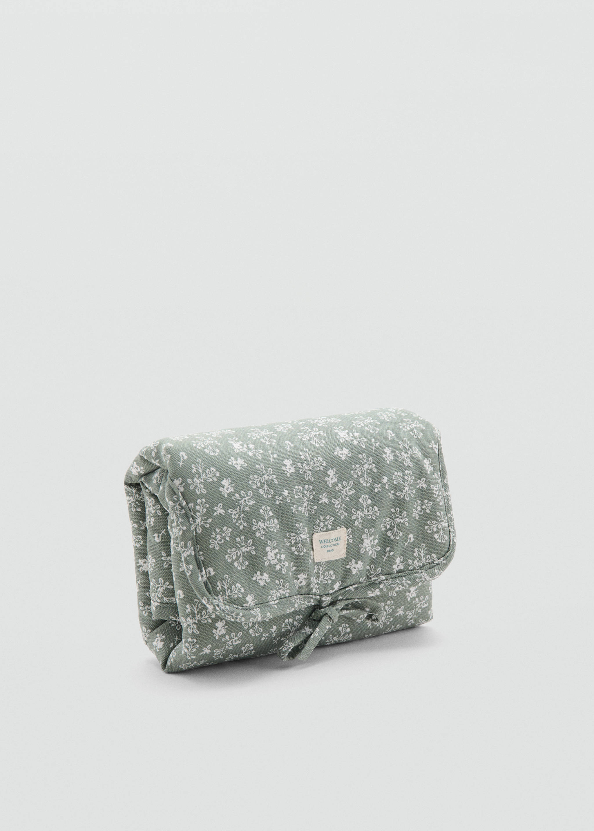 Cambiador de viaje flores - Plano medio