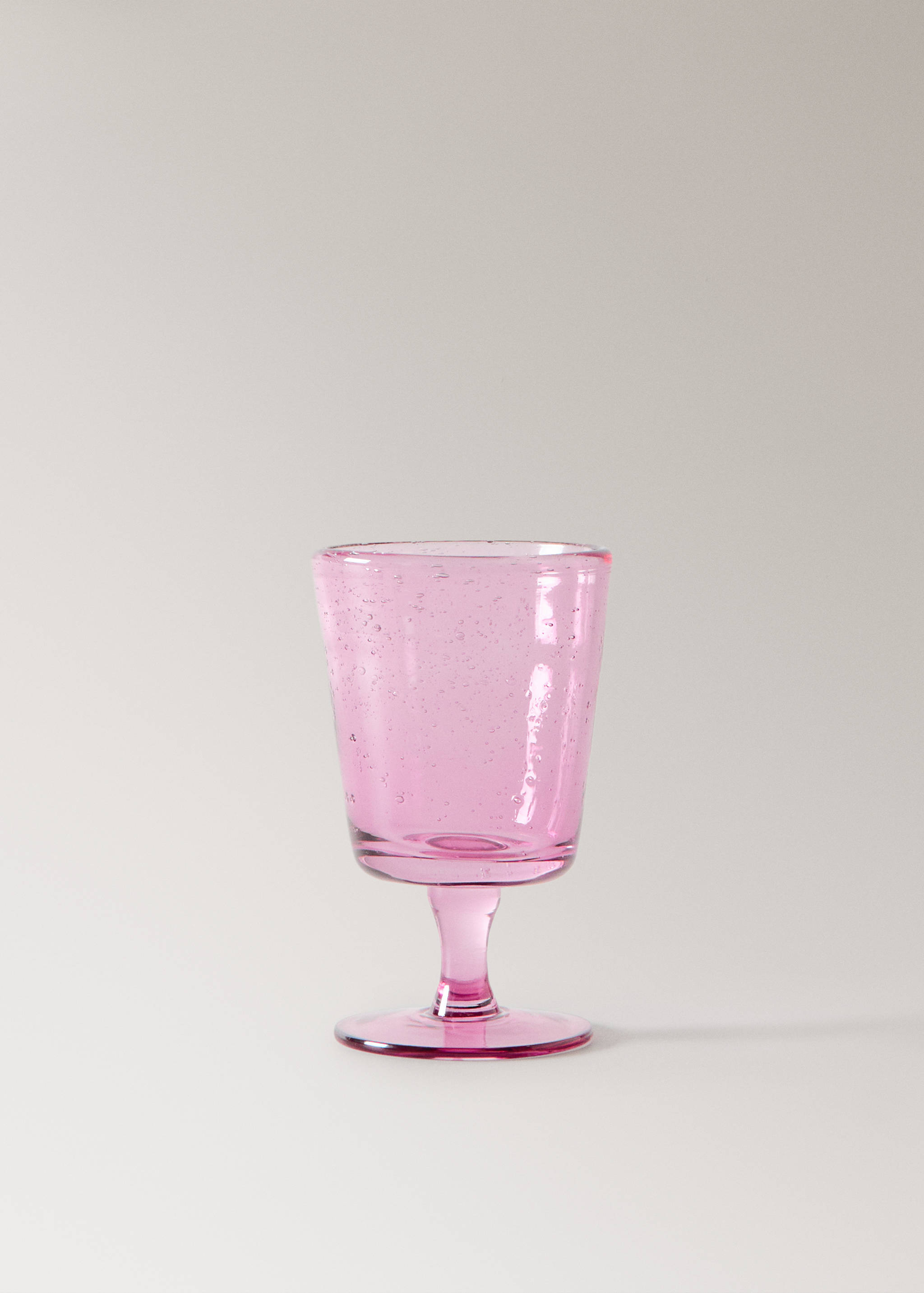 Färgat glas på fot med bubblor - Artikel utan modell