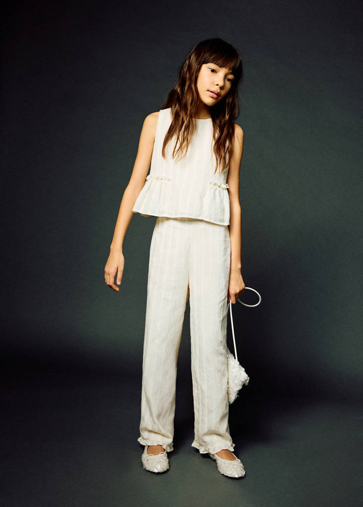 Textured trousers with ruffled hem — Ecru