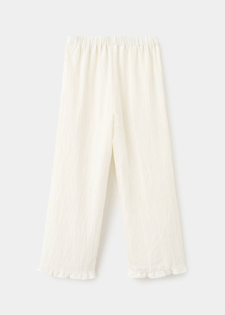 Textured trousers with ruffled hem — Ecru