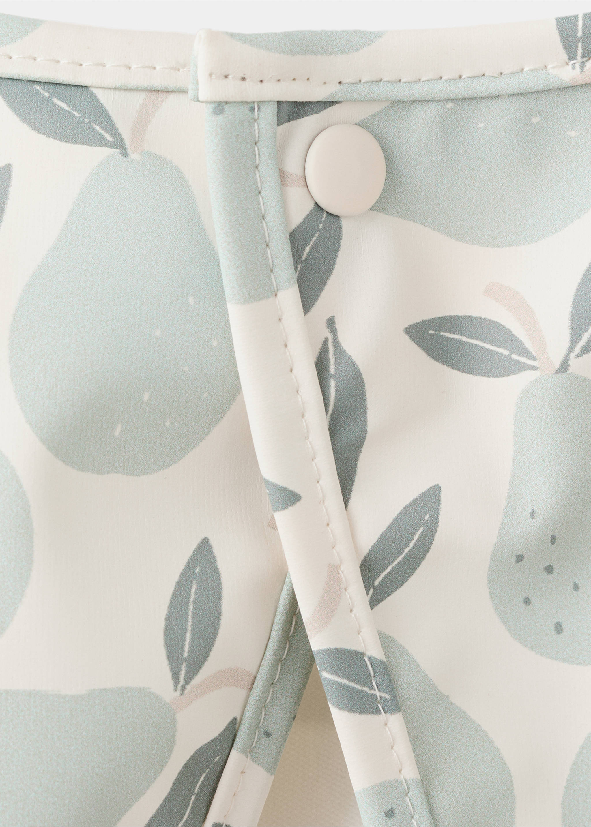 Printed bib - Details of the article 2, Off White. Ref: 27084767-00.