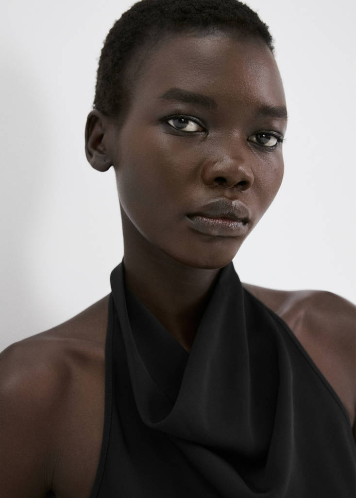 Halter neck jumpsuit with combined detailing — Black