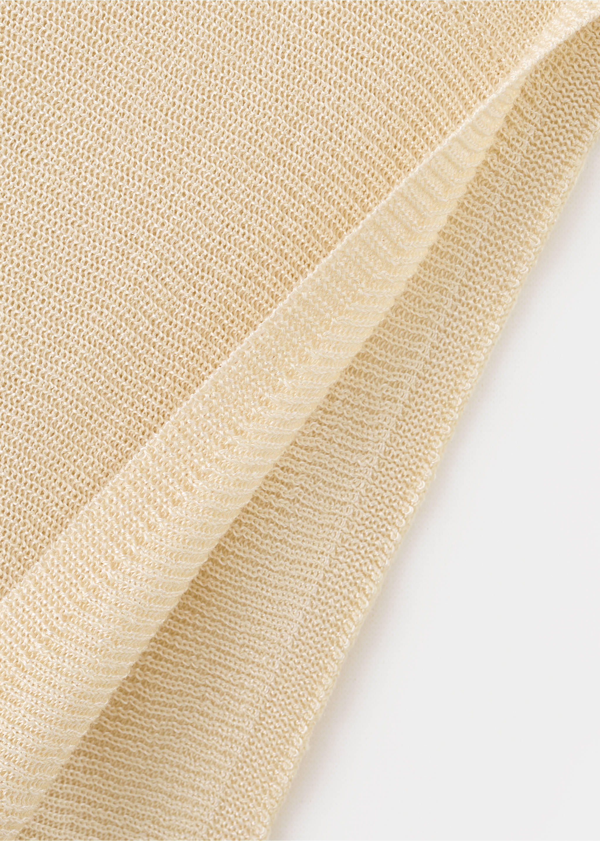 Asymmetrical knitted cape - Details of the article 8, Pastel Yellow. Ref: 27087143-00.