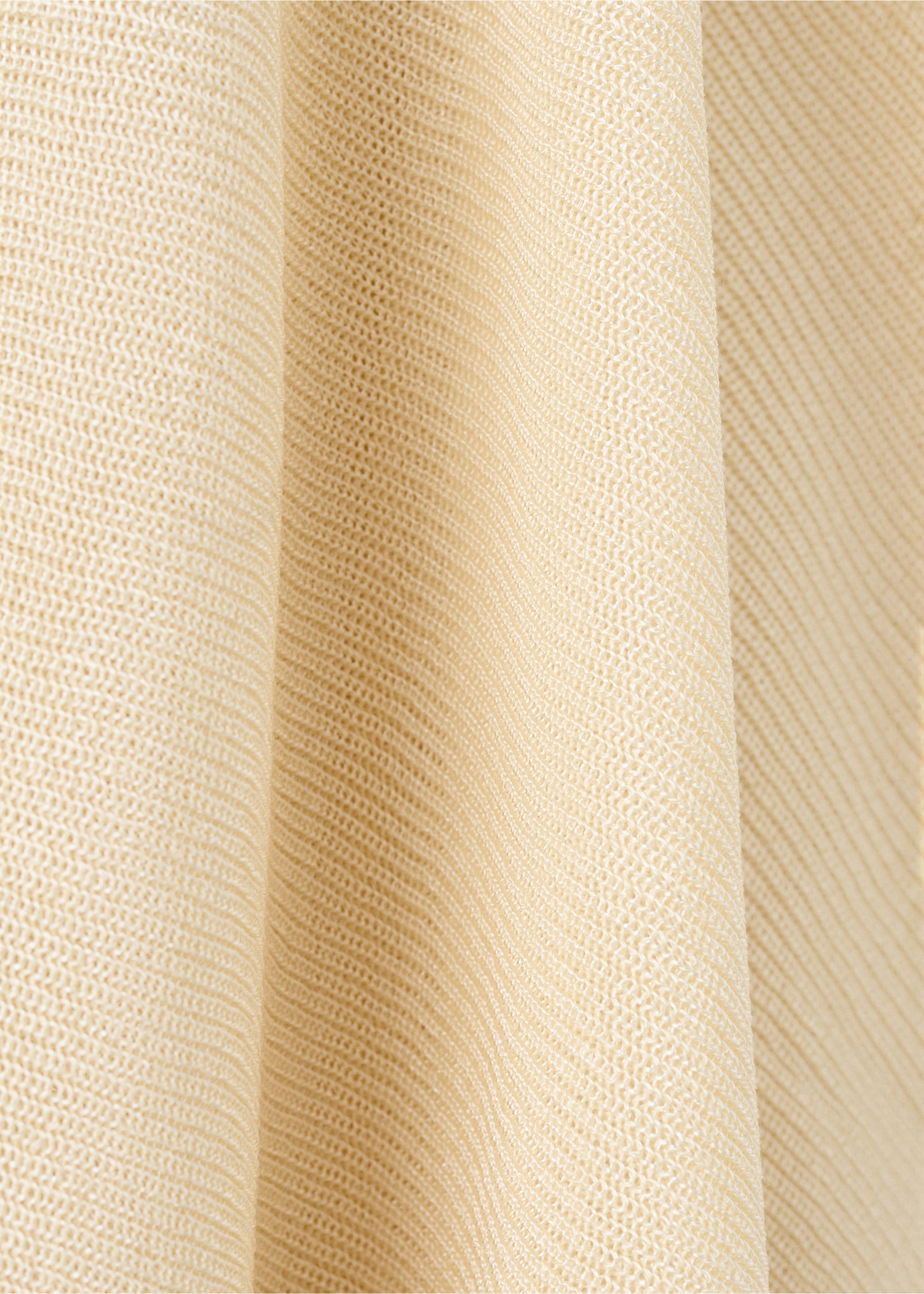 Asymmetrical knitted cape - Details of the article 0, Pastel Yellow. Ref: 27087143-00.