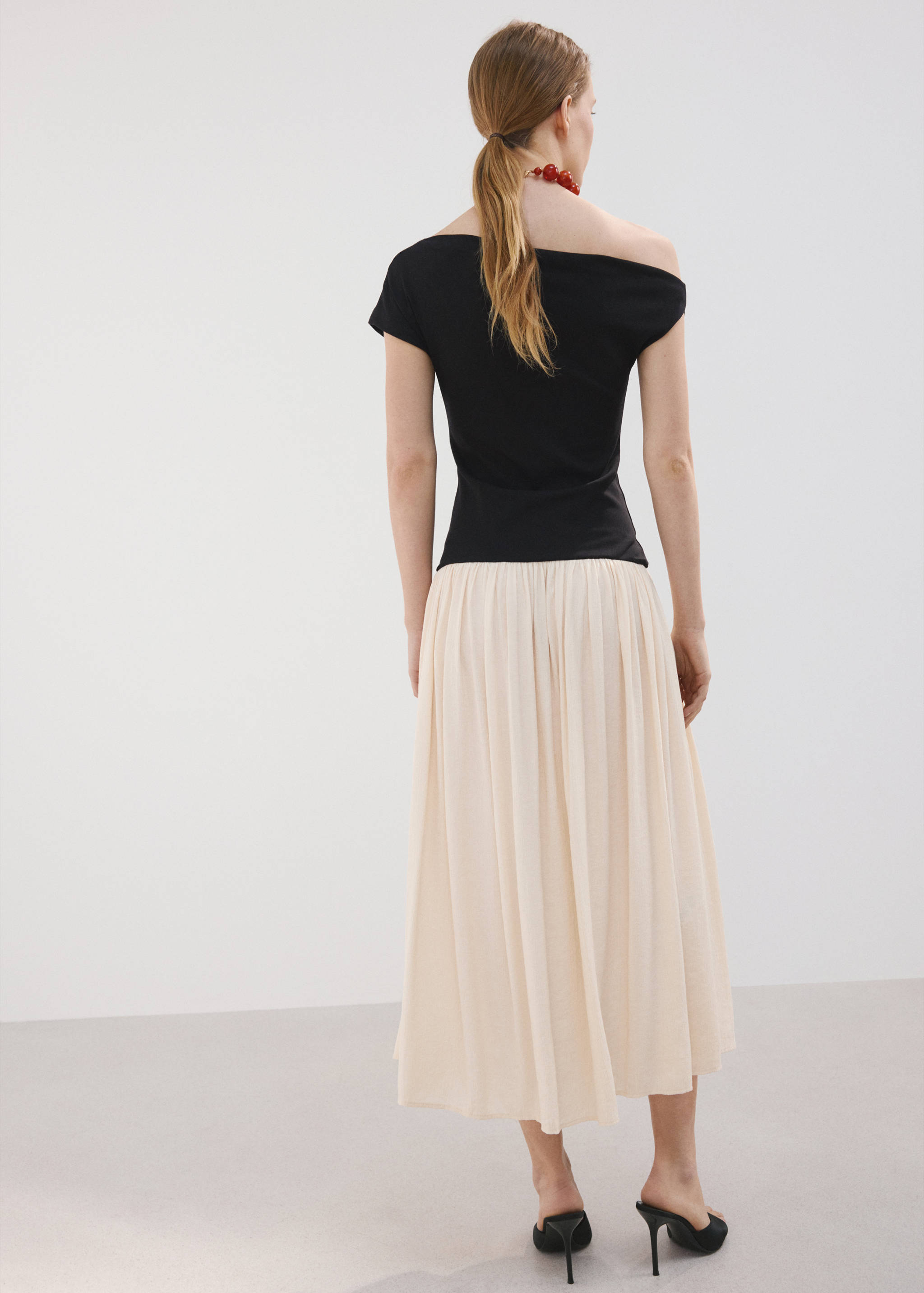 Vestit asimètric evasé - Revers de l'article