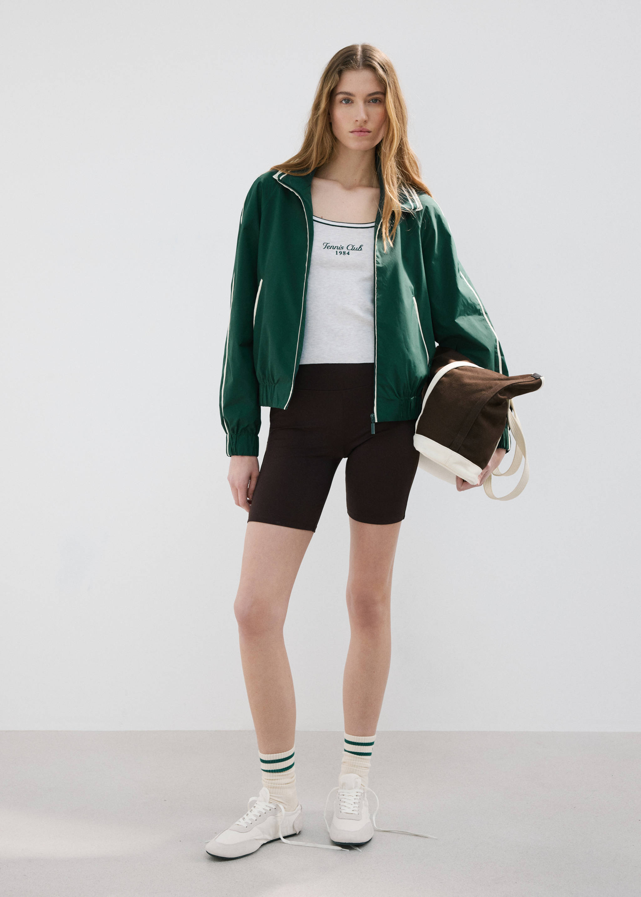 Top with embroidered message and contrasting trim - General plane