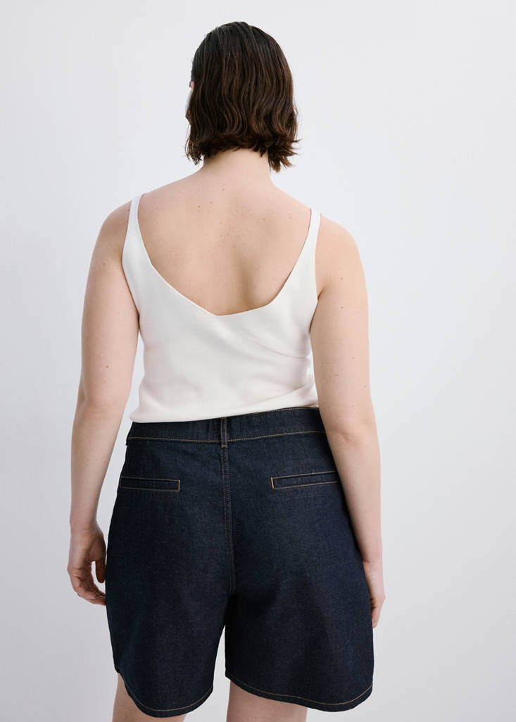 Mid-rise denim bermuda shorts with pleats — Open Blue