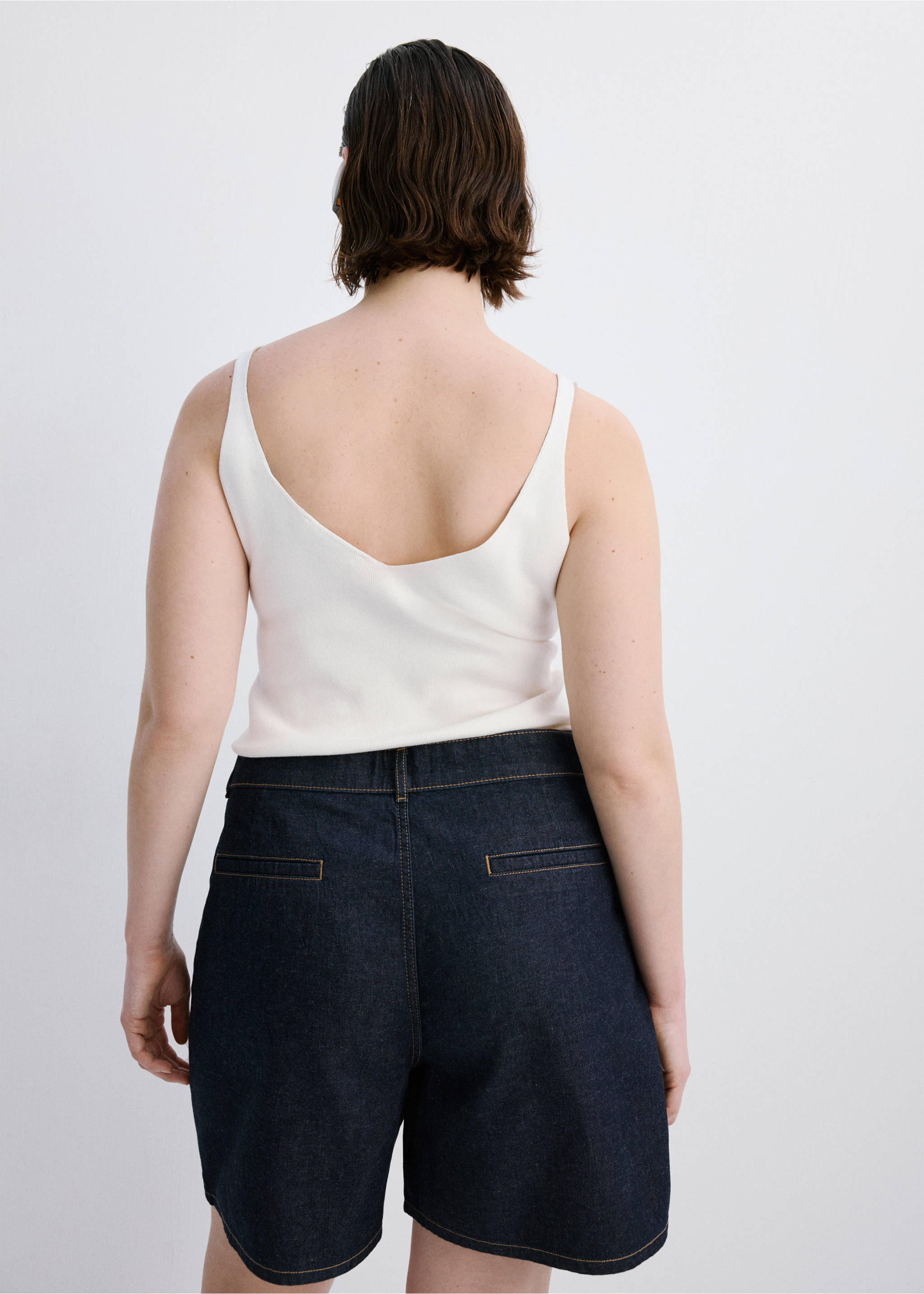 Mid-rise denim bermuda shorts with pleats - Details of the article 4, Open Blue. Ref: 27087923-00.