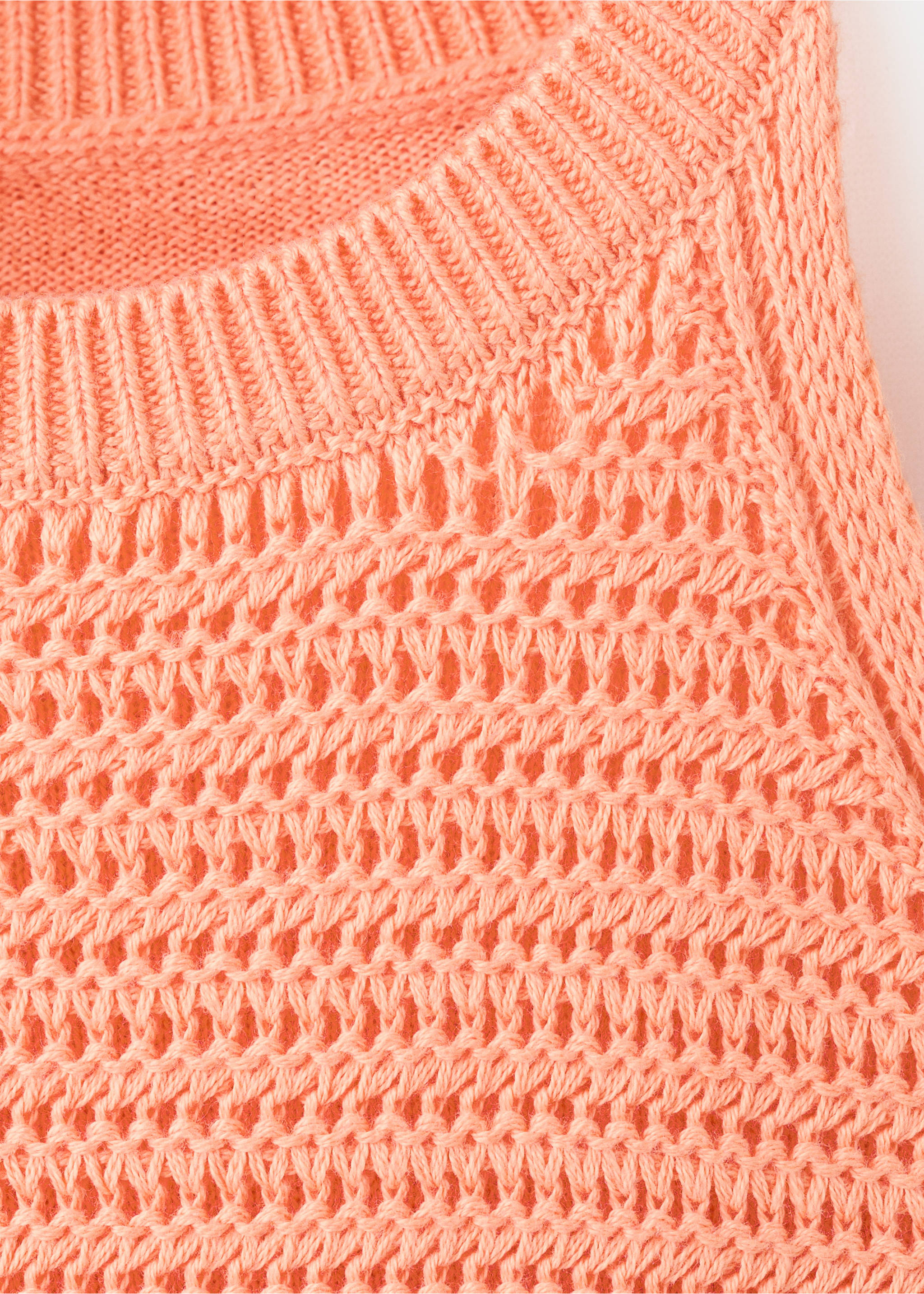 Openwork knit dress with fringes - Details of the article 8, Pastel Orange. Ref: 27087924-00.