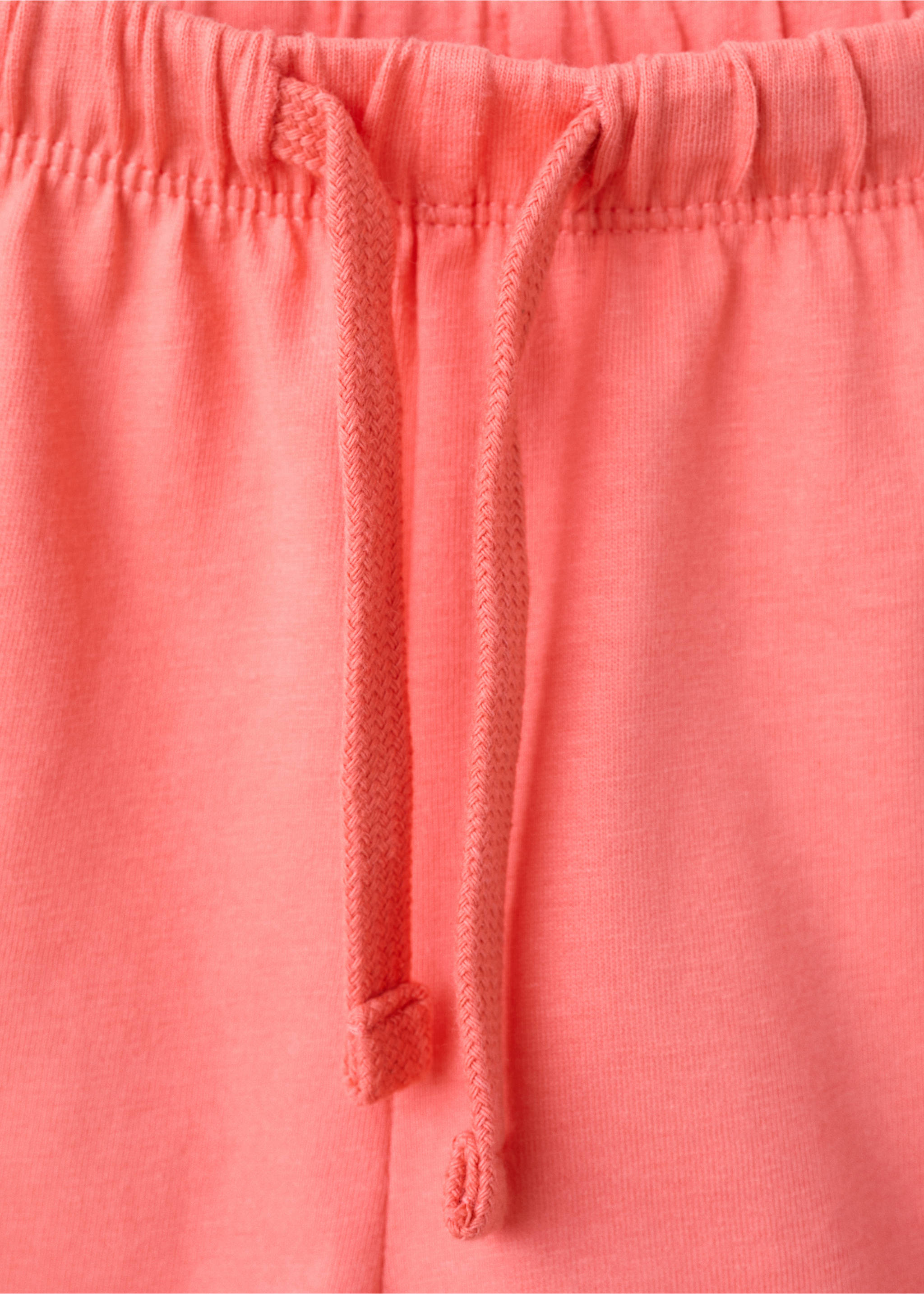 Cotton shorts with scalloped details - Details of the article 8, Coral Red. Ref: 27088268-00.