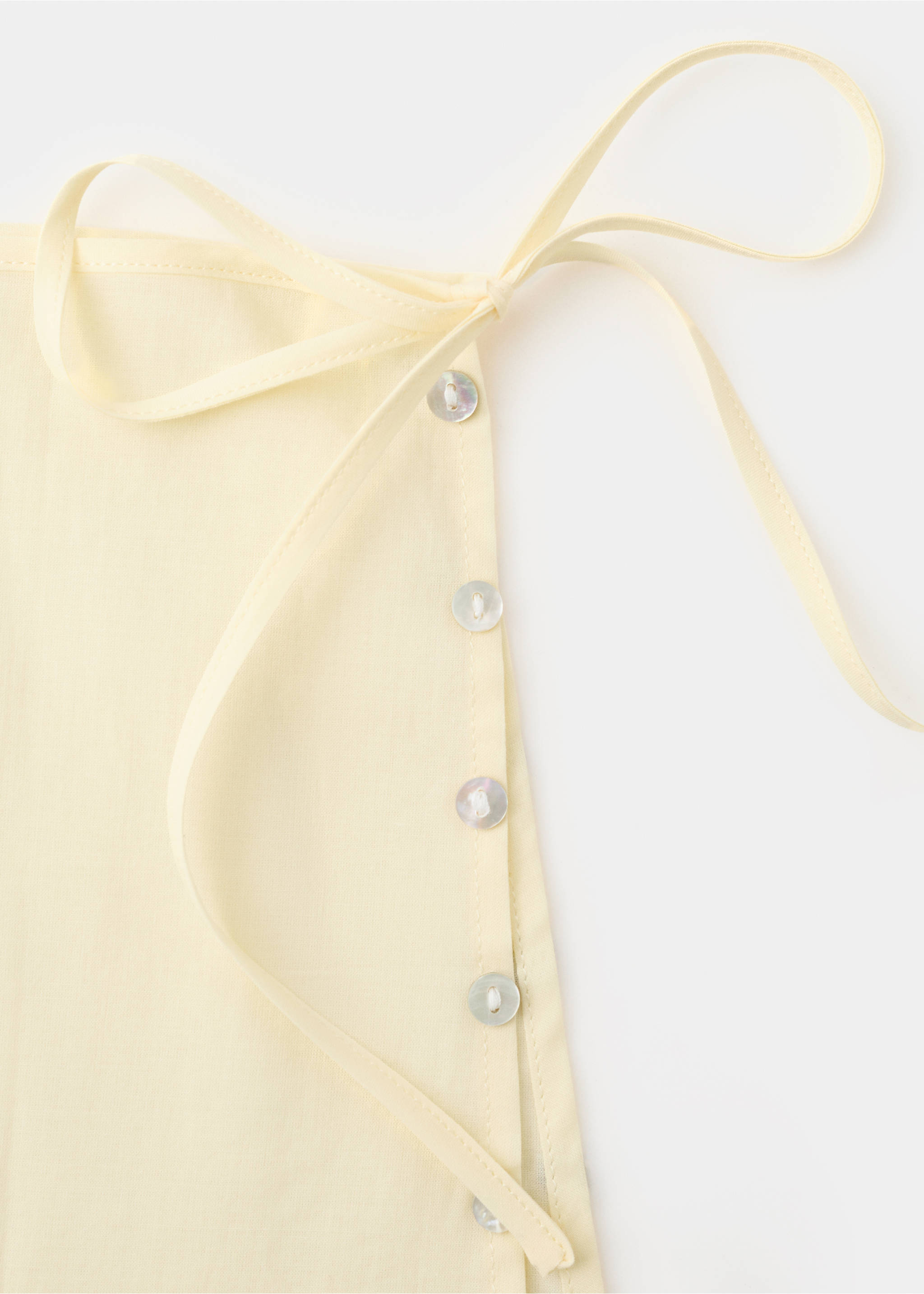 Cotton skirt with button detail - Details of the article 8, Pastel Yellow. Ref: 27088656-00.